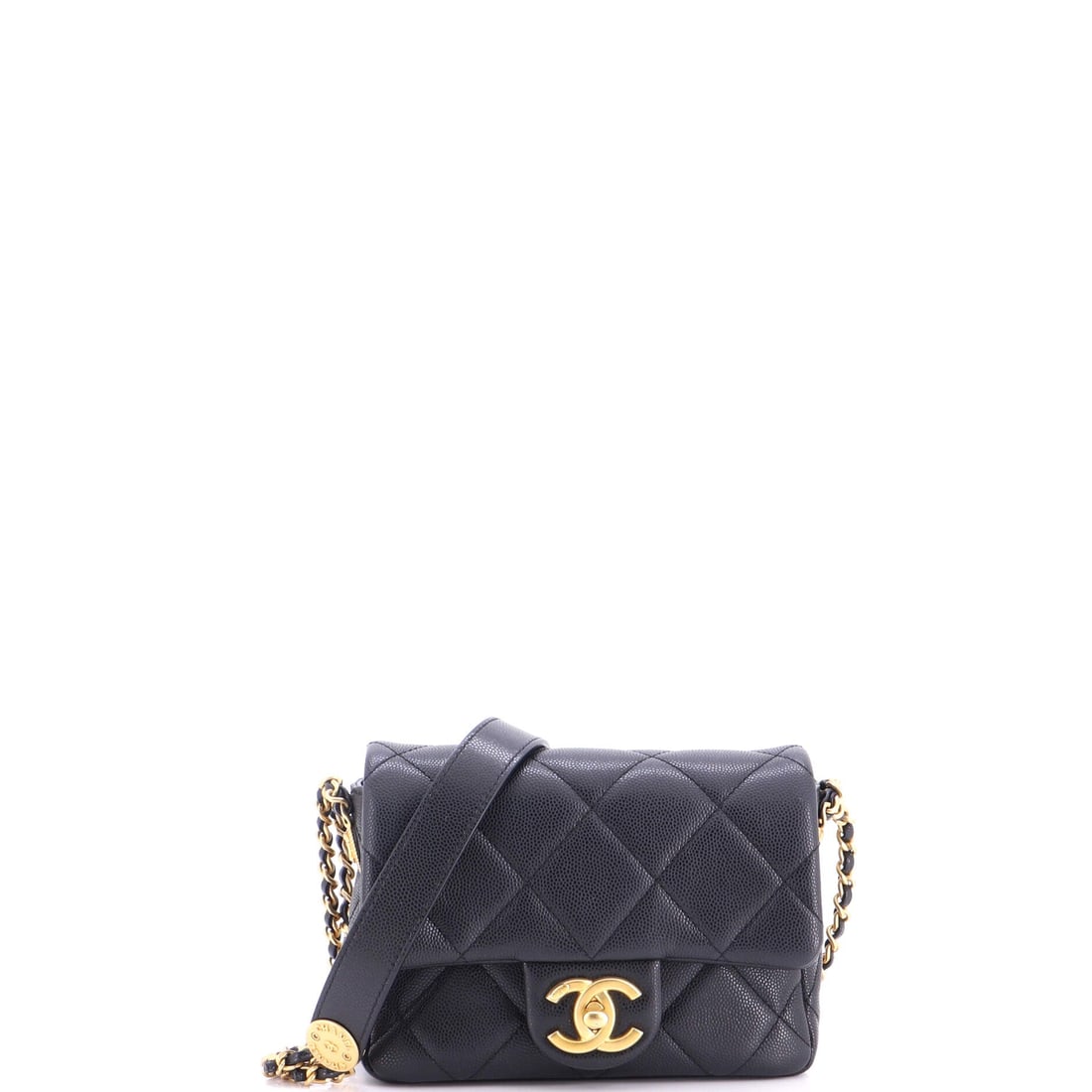 Chanel Twist Your Buttons Flap Bag Quilted Caviar: Caviar leather gives the Twist Your Buttons flap its grain and its resilience, holding the quilting crisp across a small 6.5 x 5 x 2 in frame. The turn-button treatment is the point of the model, and 