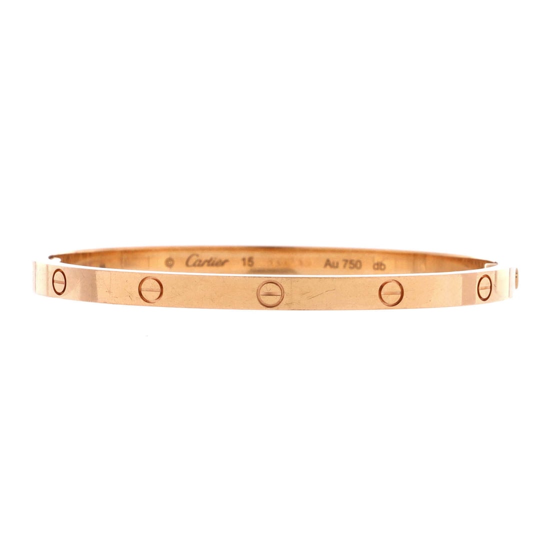 Cartier Love Bracelet 18K Rose Gold: Thin at 3.5 mm, this rose gold Love bangle is the small model, and it wears like a bracelet you stop noticing. Screws at each end hold the two halves together, with no clasp to fail. Grade C - Very Go