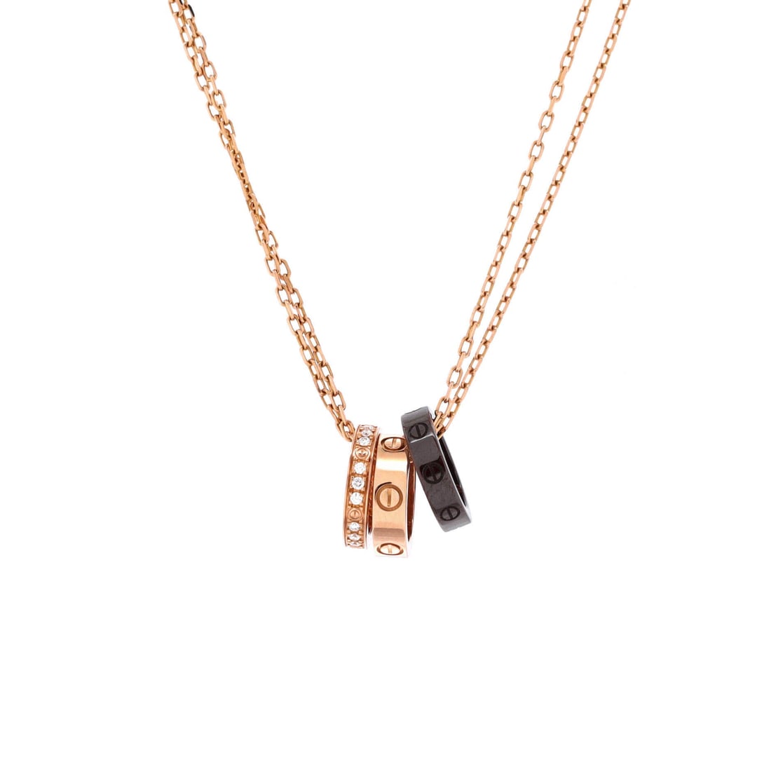 Cartier Love 3 Ring Pendant Necklace 18K Rose Gold and Ceramic with Diamonds: Interlocking gold and ceramic rings give this Love pendant its two-tone contrast, diamonds confined to the metal. The motif spans 10.8 by 7.7 mm on a chain adjustable between 15 and 16 inches. Grade C