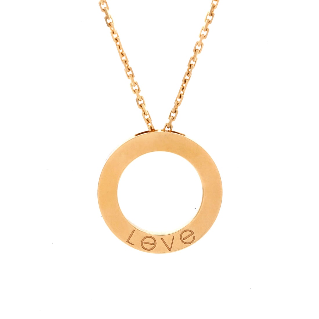 Cartier Love Pendant Necklace 18K Yellow Gold: The 23.55 mm Love disc is large enough to be the only thing worn above the neckline, and in yellow gold it carries warmth that white metal cannot. Chain adjustment from 15.5 to 16.5 in covers the diff