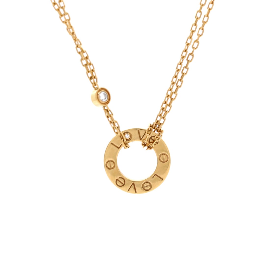 Cartier 2 Diamonds Love Pendant Necklace 18K Yellow Gold and Diamonds: Screw heads and two diamonds across 13.05 mm of yellow gold: the appeal of the Love pendant is that the pattern needs no explaining. Its chain spans 15 to 16 inches, the most usual setting in the line