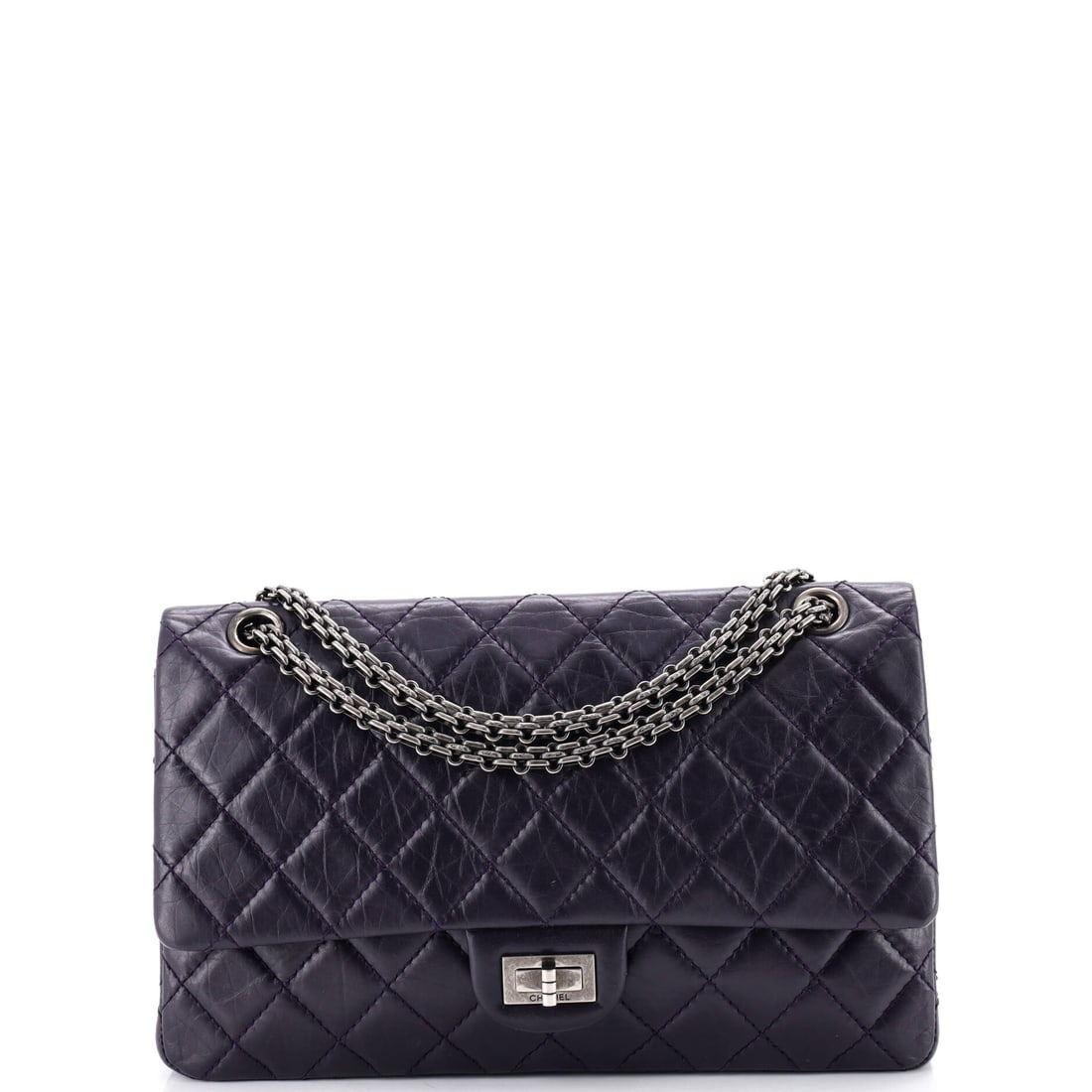 Chanel Reissue 2.55 Flap Bag Quilted Aged Calfskin: Eleven by seven inches is the Reissue proportion most bidders picture, wide enough to read as a shoulder bag and shallow enough at 3.5 in to stay flat against the body. The woven chain runs 19.5 in si