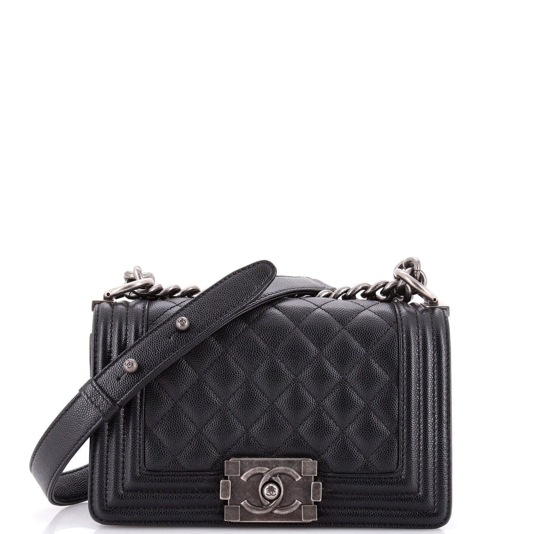 Chanel Boy Flap Bag Quilted Caviar: Structure is the point of this model: a rigid rectangular frame, a flat bottom, a flap that closes flush, all of it in quilted caviar that will not slump. An 8 by 5 by 3 inch body and 11.5-inch chain 