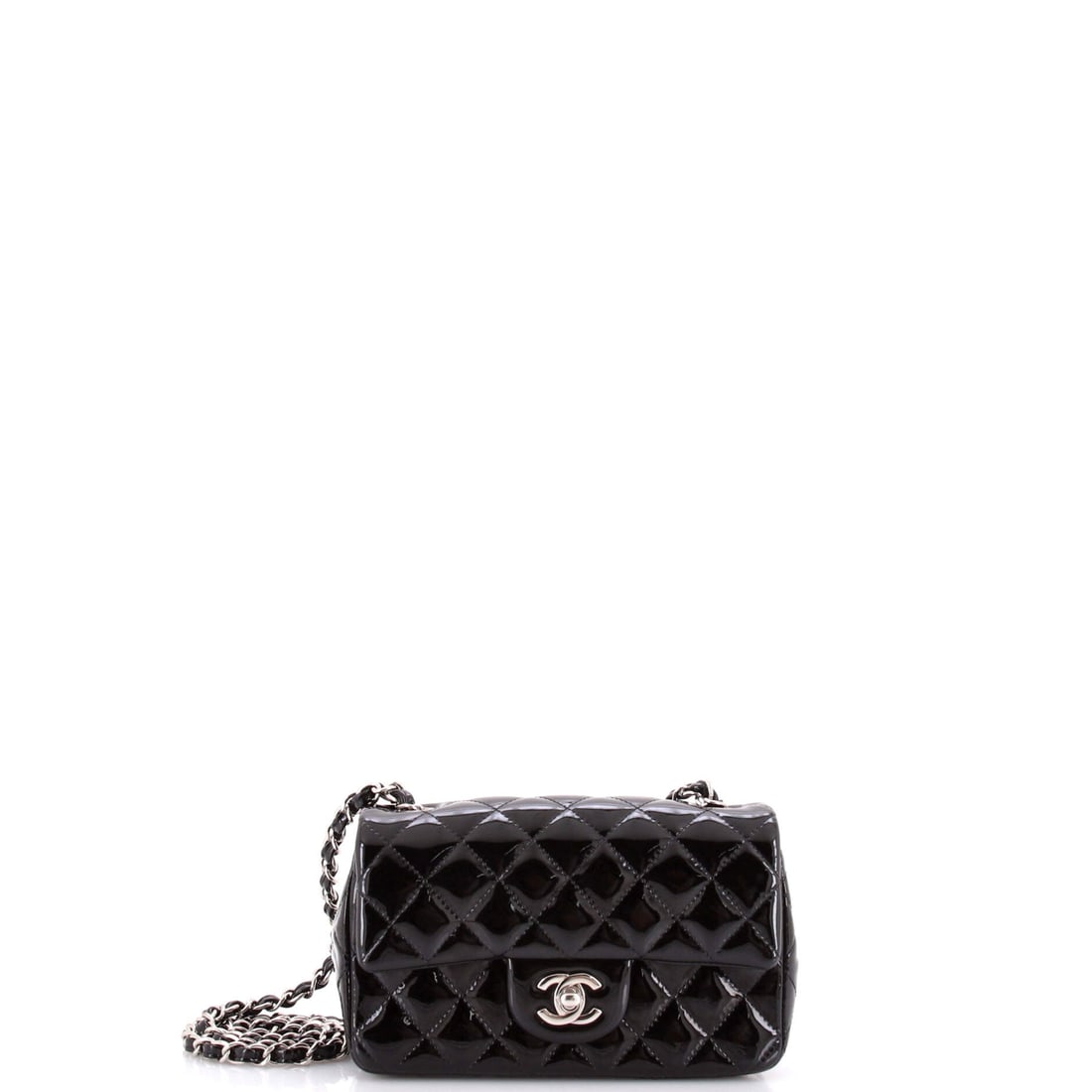 Chanel Classic Single Flap Bag Quilted Patent: Patent quilting gives this Classic Single Flap a high-shine read that lambskin cannot match, holding its diamond lines crisply across the front. At 7.5 inches wide and 5 inches tall with a 2 inch dept
