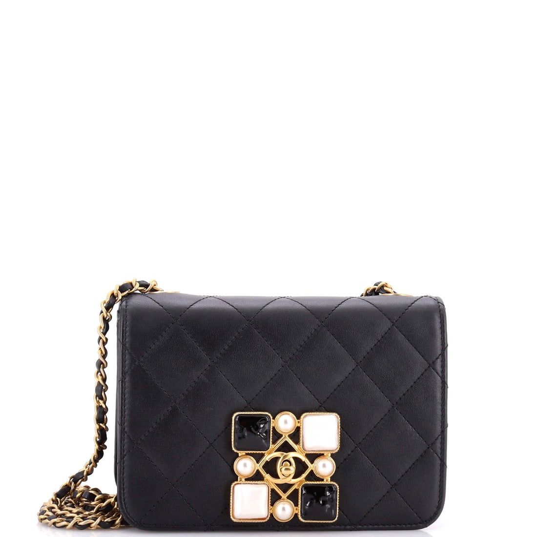 Chanel Resin and Pearl CC Full Flap Bag Quilted Calfskin: Calfskin quilting gives this full flap more structure than a lambskin version would, so the resin and pearl CC stays square on the front panel. At 7 x 5 x 2 in it is deliberately small, sized for even