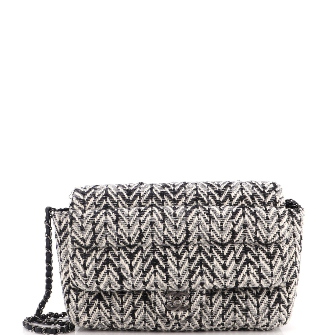 Chanel CC Chain Single Flap Bag Quilted Herringbone Tweed: Herringbone tweed quilting gives this single flap a textile warmth that leather versions cannot match, and it rewards a close look. At W 11.5 x H 7 x D 3 in it is a large flap, and the 15 in strap dro
