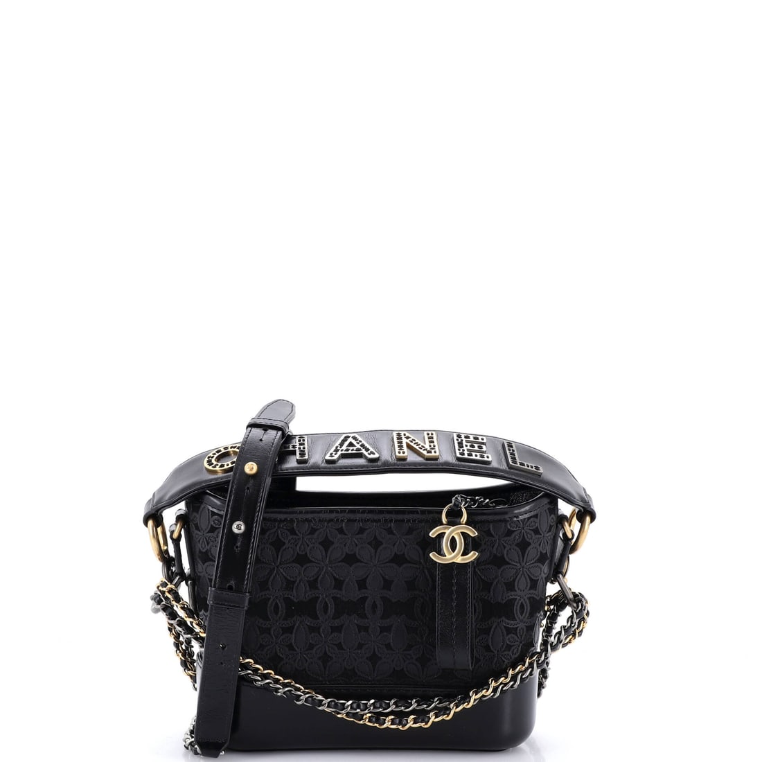 Chanel Gabrielle Hobo with Logo Handle Laser Cut Calfskin and Wool Felt: Wool felt beneath laser-cut calfskin gives this Gabrielle Hobo a surface closer to a textile than a leather goods piece, which is much of its appeal. At 8 by 6 by 3 inches with an 8-inch handle drop i