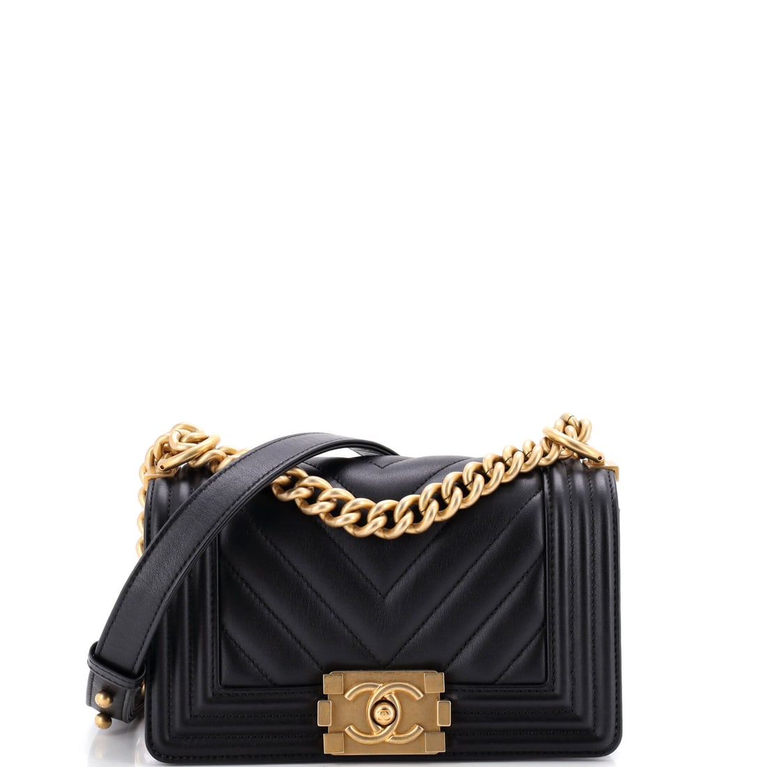 Chanel Boy Flap Bag Chevron Lambskin: Chevron lambskin gives this Boy flap a directional surface that reads cleaner than diamond quilting, and the chunky push-lock keeps the front graphic and unfussy. At 8 by 5 by 3 inches it sits in the 