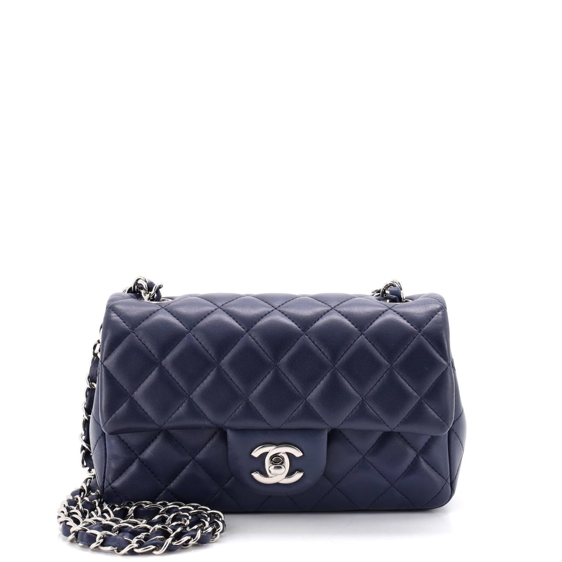 Chanel Classic Single Flap Bag Quilted Lambskin: Puffed diamond quilting over lambskin, on the single flap body at W 7.5 x H 5 x D 2.5 in. The 12.5 in doubled drop and 23 in single drop make this two bags depending on how the chain is run. Lambskin 