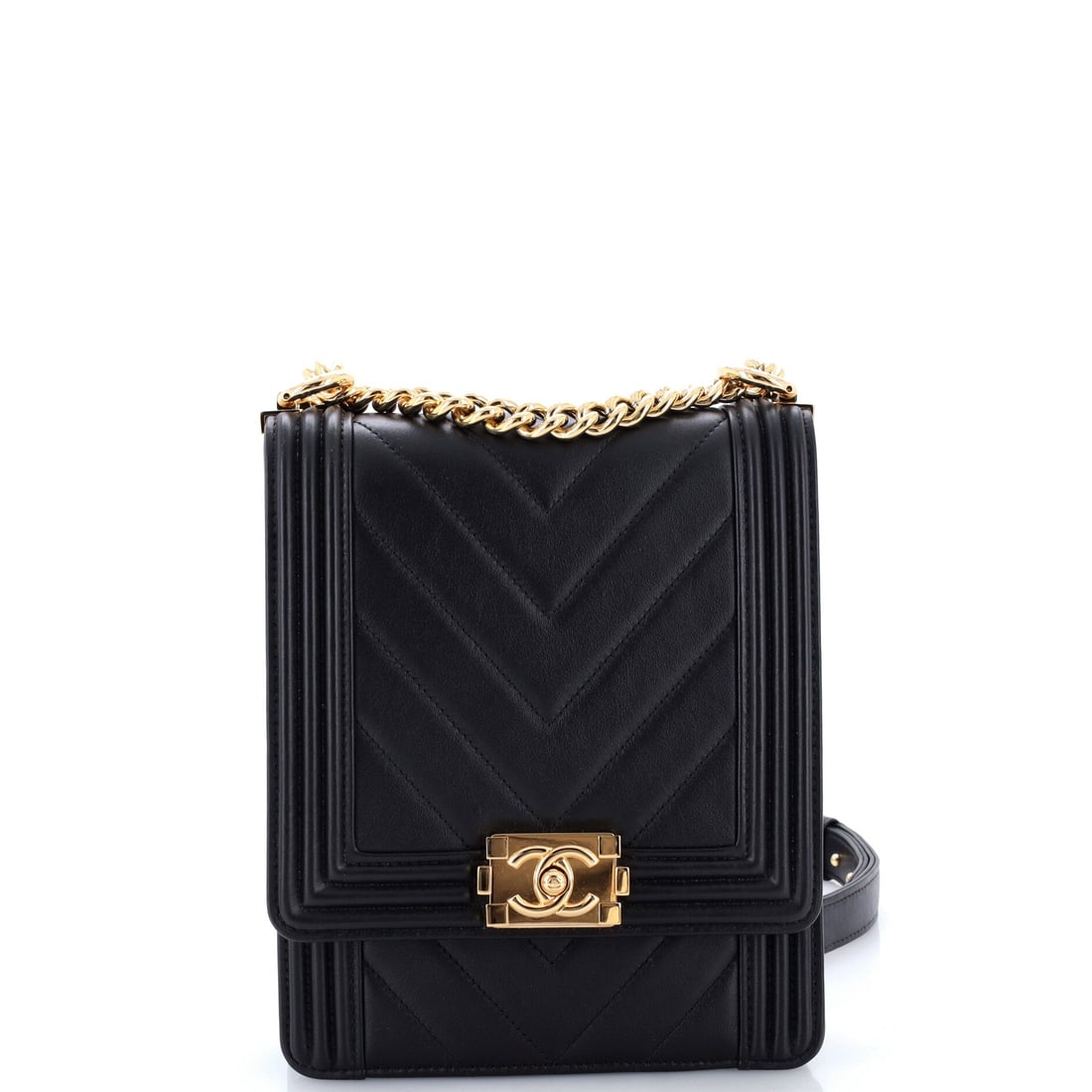 Chanel North South Boy Flap Bag Chevron Lambskin: North-south proportions flip the Boy onto its end: 6.5 inches wide against 8.5 high, on a 3 inch base, so it stands tall instead of spreading. Chevron lambskin runs its stripes vertically up that heig