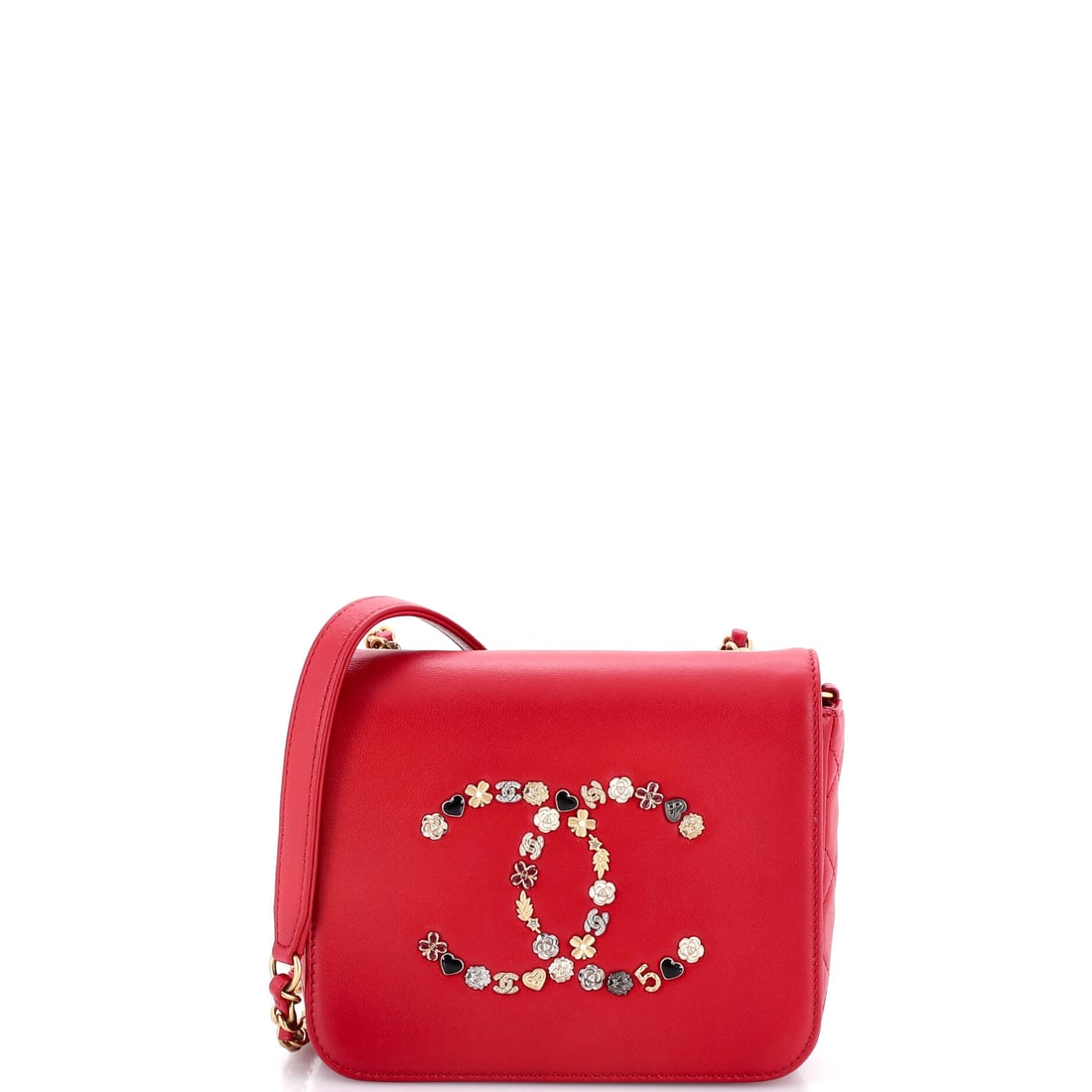Chanel Giant Crystal CC Flap Bag Lambskin: An oversized crystal CC clasp is the entire proposition on this small lambskin flap, and it does the work of jewellery on a 6.5 by 5 by 2-inch body. The bag itself stays plain, smooth lambskin with no