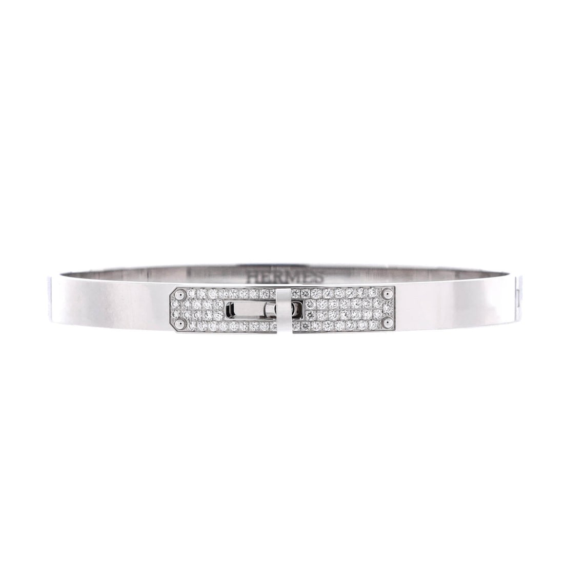 Hermes Kelly Bracelet 18K White Gold and Pave Diamonds: The Kelly padlock-and-strap motif translates cleanly into white gold here, with the pave set tight so light stays inside the outline of the hardware. A 5.5 mm width gives the band presence on the wris