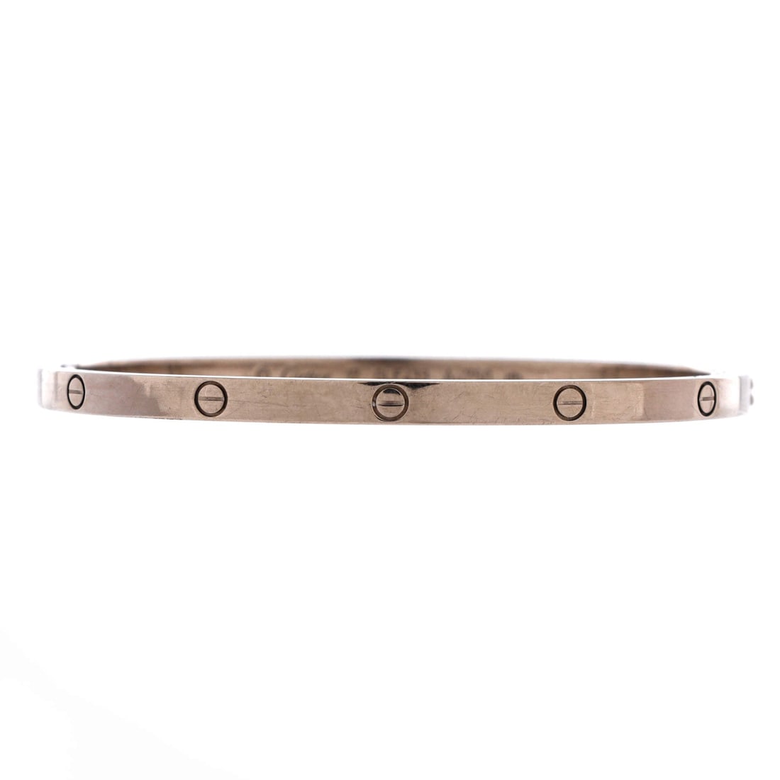 Cartier Love Bracelet 18K White Gold: Small model dimensions, 3.65 mm of white gold, and the screw closure that defines the line: the Love bangle at its most wearable scale. It sits close on a slim wrist, where the narrow band looks propo