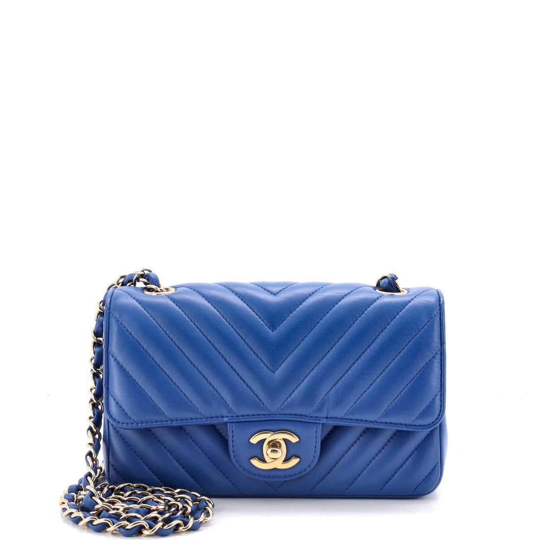 Chanel Classic Single Flap Bag Chevron Lambskin: Chevron lambskin on the single flap silhouette, with the pattern's diagonals meeting cleanly at the center seam and the turnlock set above. Lambskin gives the chevron a plush surface that softens the 
