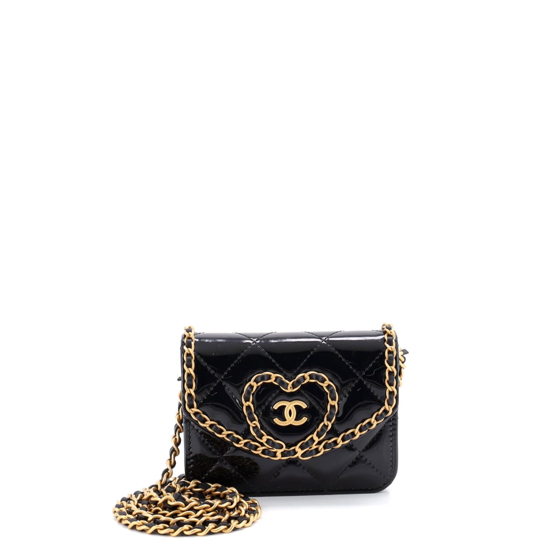 Chanel Heart Chain Flap Bag Quilted Patent: Quilting laid onto a heart panel has to shrink to fit, and that miniature diamond scale is half the charm. Small numbers throughout, 4.5 inches wide, 3.5 tall and 2 deep, keep this in the accessory br