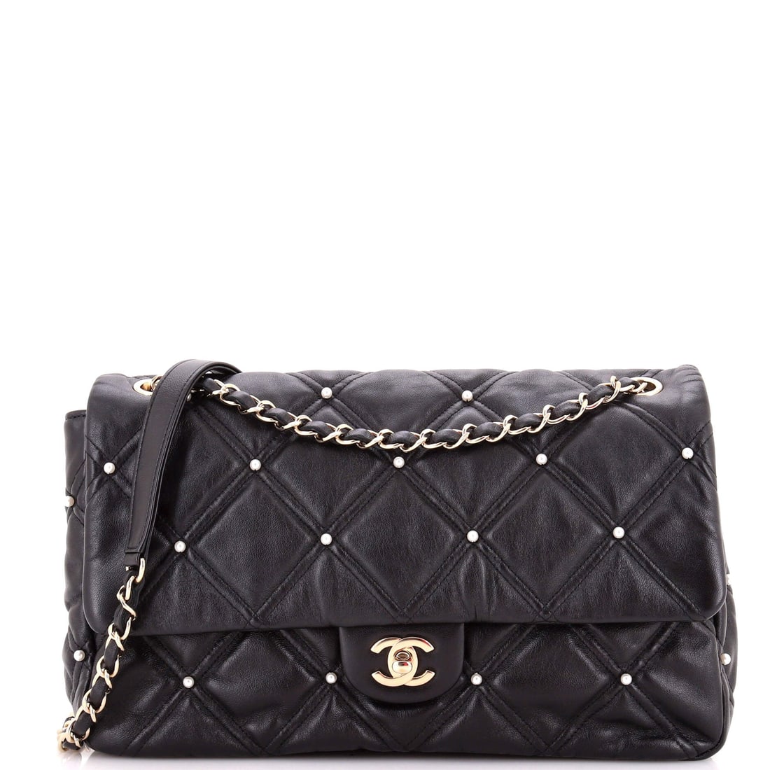 Chanel CC Flap Bag Pearl Studded Quilted Lambskin: Pearl studding across the quilted lambskin turns a standard CC flap into something with texture you can read at a distance. The studs sit within the quilt channels, so the diamond structure still gove