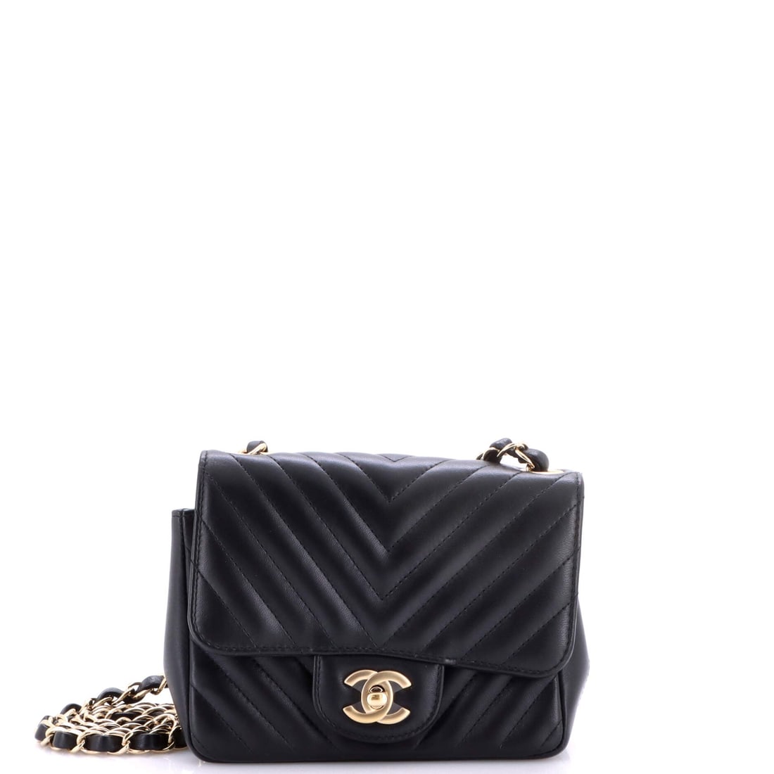 Chanel Square Classic Single Flap Bag Chevron Lambskin: Square proportions and a single flap keep this Chanel compact and disciplined, with chevron lambskin running its V-lines across the front panel. Offered in Grade B - Excellent condition. The 6.5 by 5 