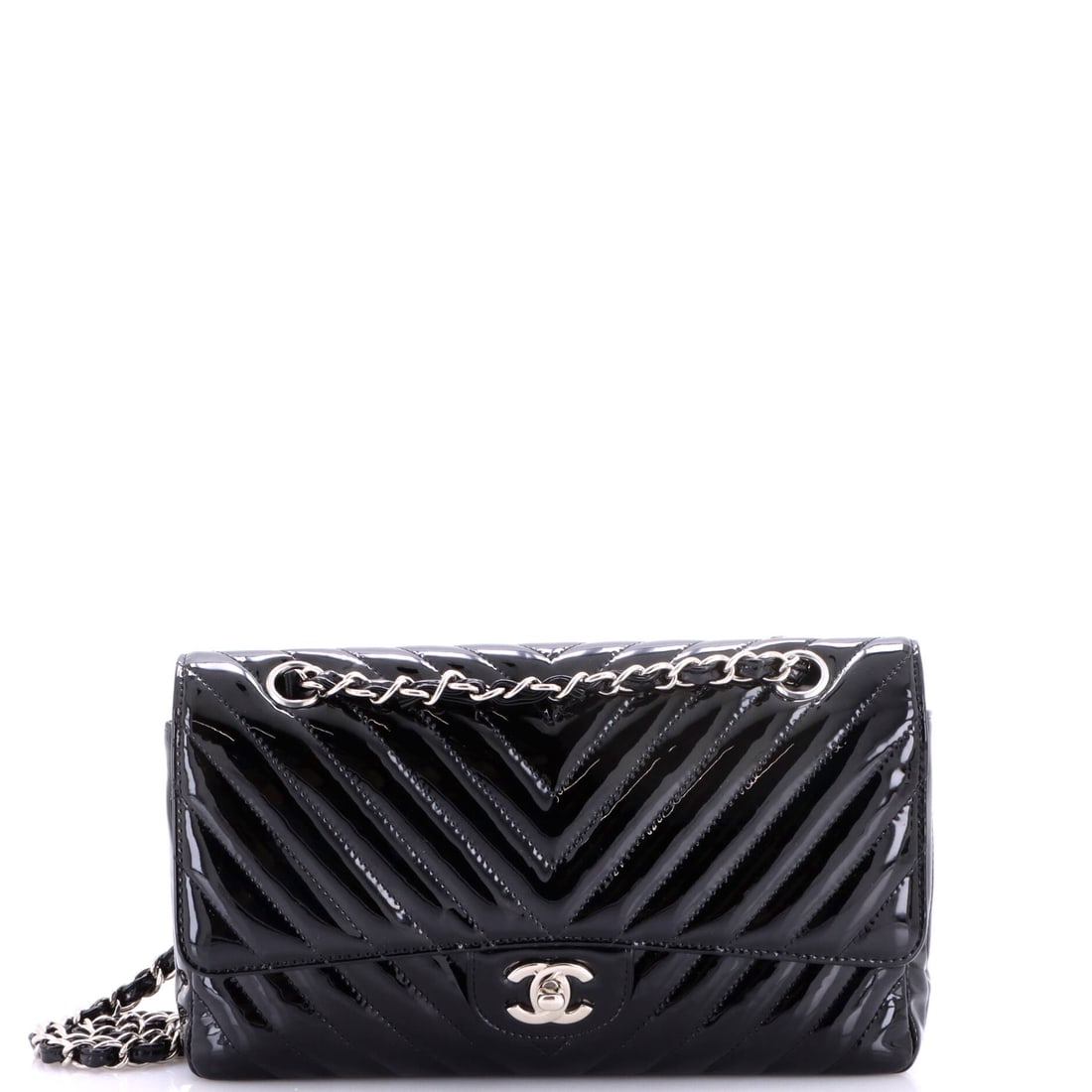 Chanel Classic Double Flap Bag Chevron Patent: Patent in chevron is high-gloss and unapologetic, throwing light along every diagonal seam. The medium footprint holds at 10 by 6 by 3 inches, with 9.5 inches of doubled chain and 17 inches at full le