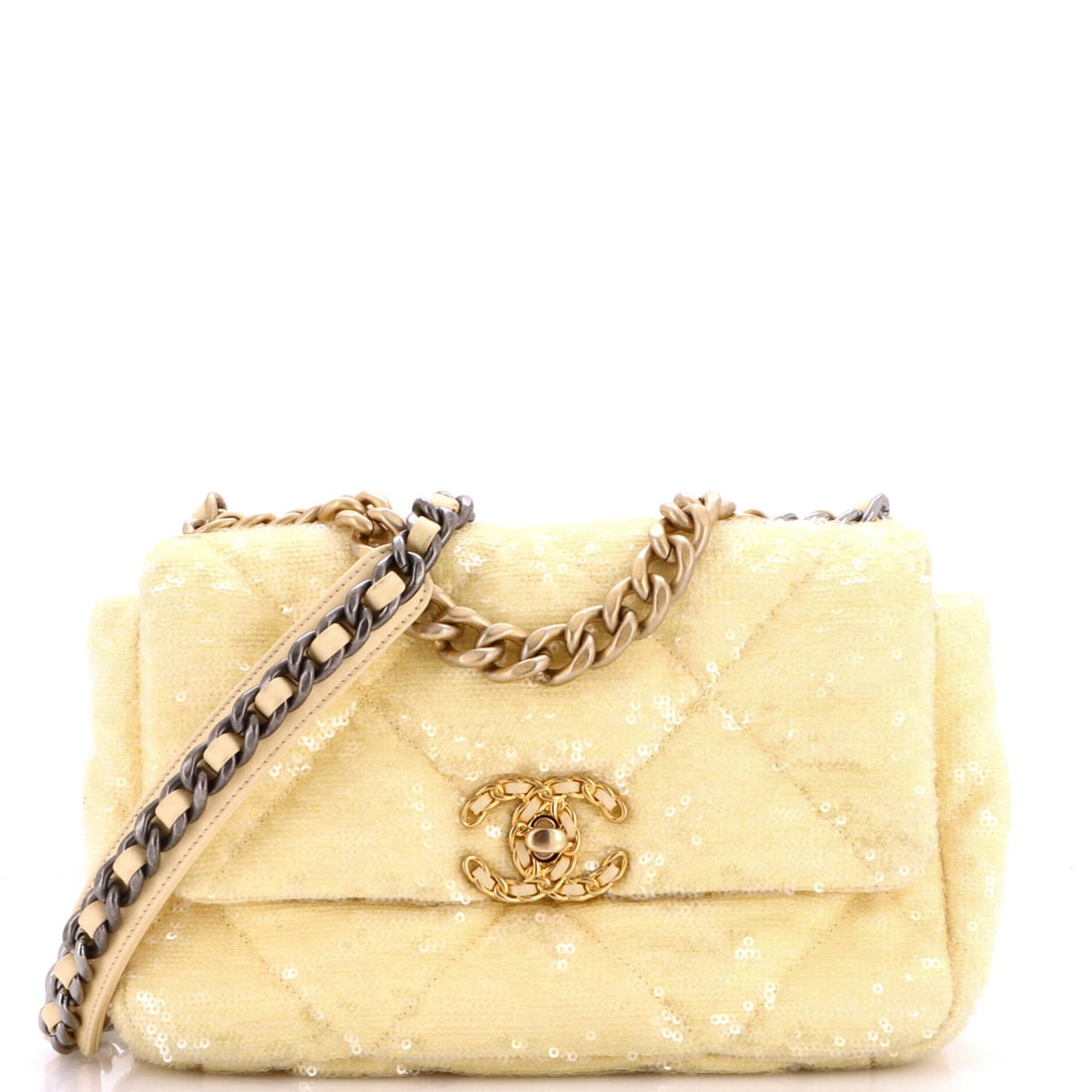 Chanel 19 Flap Bag Quilted Sequins: The chunky turnlock reads especially well against sequins, hard metal set on a shifting surface. Slim through the body at 3 inches deep and 9.5 across, it lies flat to the side on a 20.5 in strap rath
