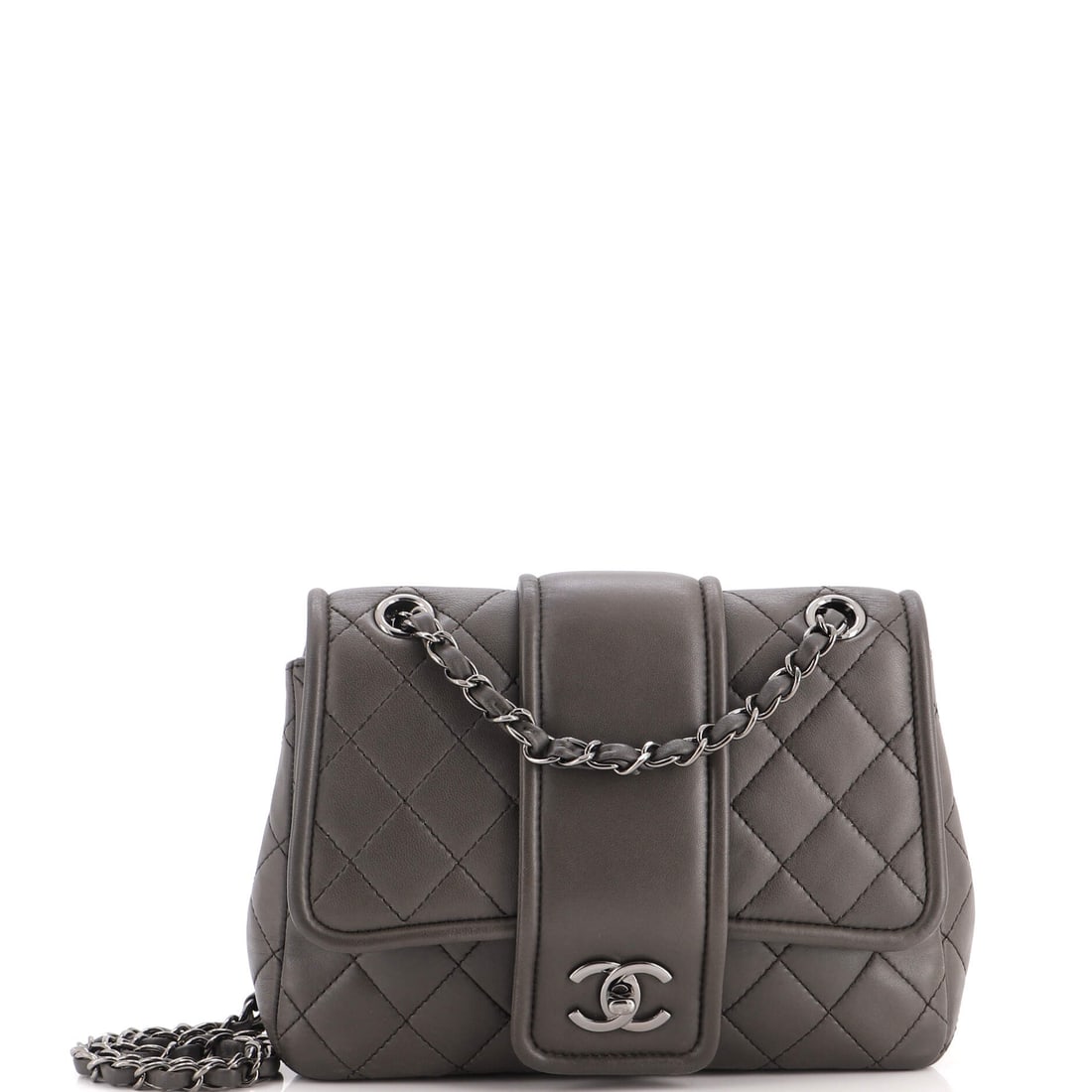 Chanel Elementary Chic Flap Bag Quilted Lambskin: Lambskin quilting on the Elementary Chic flap has a softer, more pillowed surface than caviar, and it shows across a 9 by 7.5 by 3-inch body. The 19-inch strap drop sits high on the hip for crossbody 