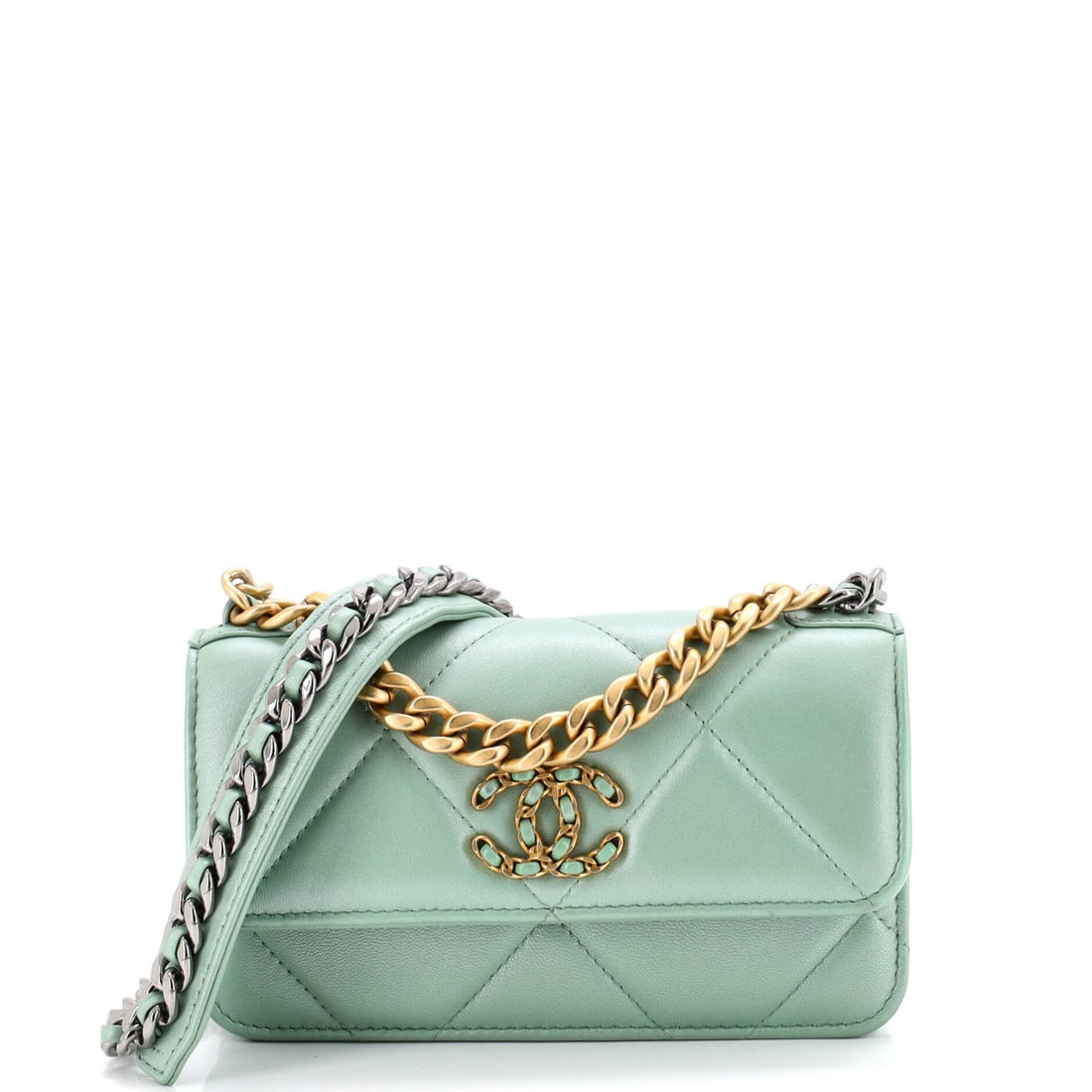 Chanel 19 Flap Phone Holder with Chain Quilted Lambskin: Small-format 19s live or die on the chain, and this one hangs from the line's woven leather and metal version, which spreads weight across the shoulder better than a plain link would. The body measure