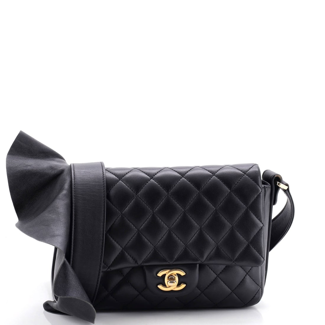 Chanel Bolero De Chanel Flap Bag Quilted Calfskin: The Bolero de Chanel flap sits close to square at 7.5 inches wide by 7 high, an unusually upright proportion for a quilted calfskin flap. Marked Grade B - Excellent. A 20 inch strap drop puts it at th