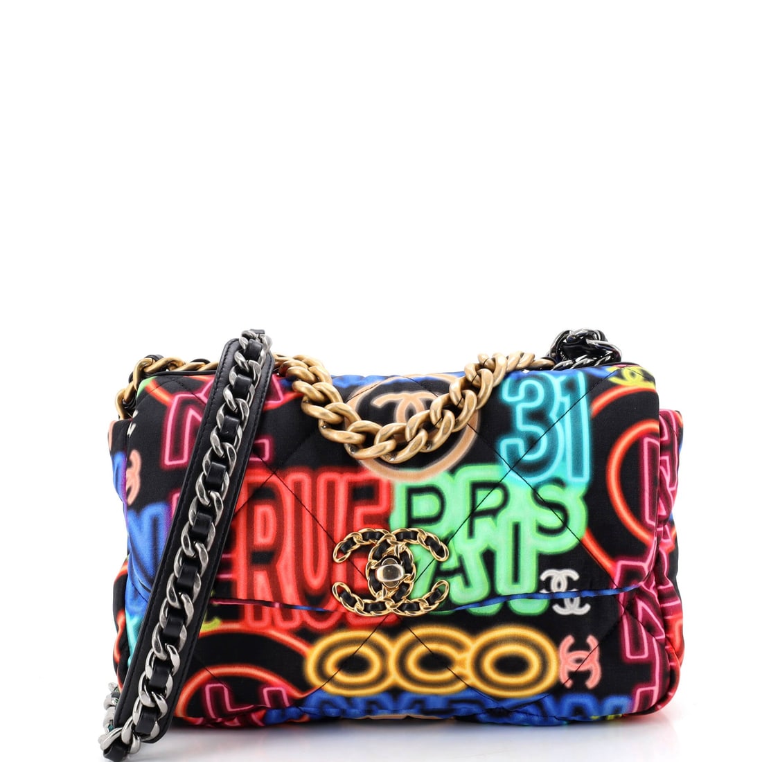 Chanel 19 Flap Bag Quilted Graffiti Print Fabric: Graffiti print across quilted fabric puts the 19's diamond grid to louder use than the leather versions allow. Grade B - Excellent, the pattern holding its contrast. Ten by 6.5 inches on a 3 inch base