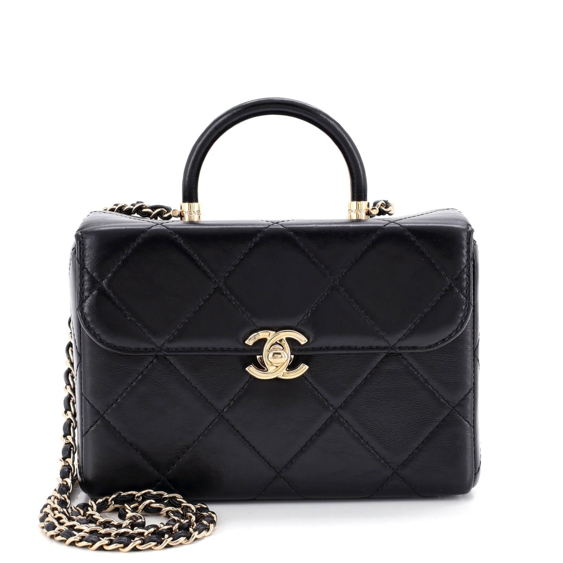 Chanel CC Top Handle Flap Vanity Case Quilted Shiny Aged Calfskin: Shiny aged calfskin gives the vanity case a lacquered depth that plain quilting does not reach. The structured 7 by 5 by 3 inch box holds its own shape whatever is inside, which is the point of the fo