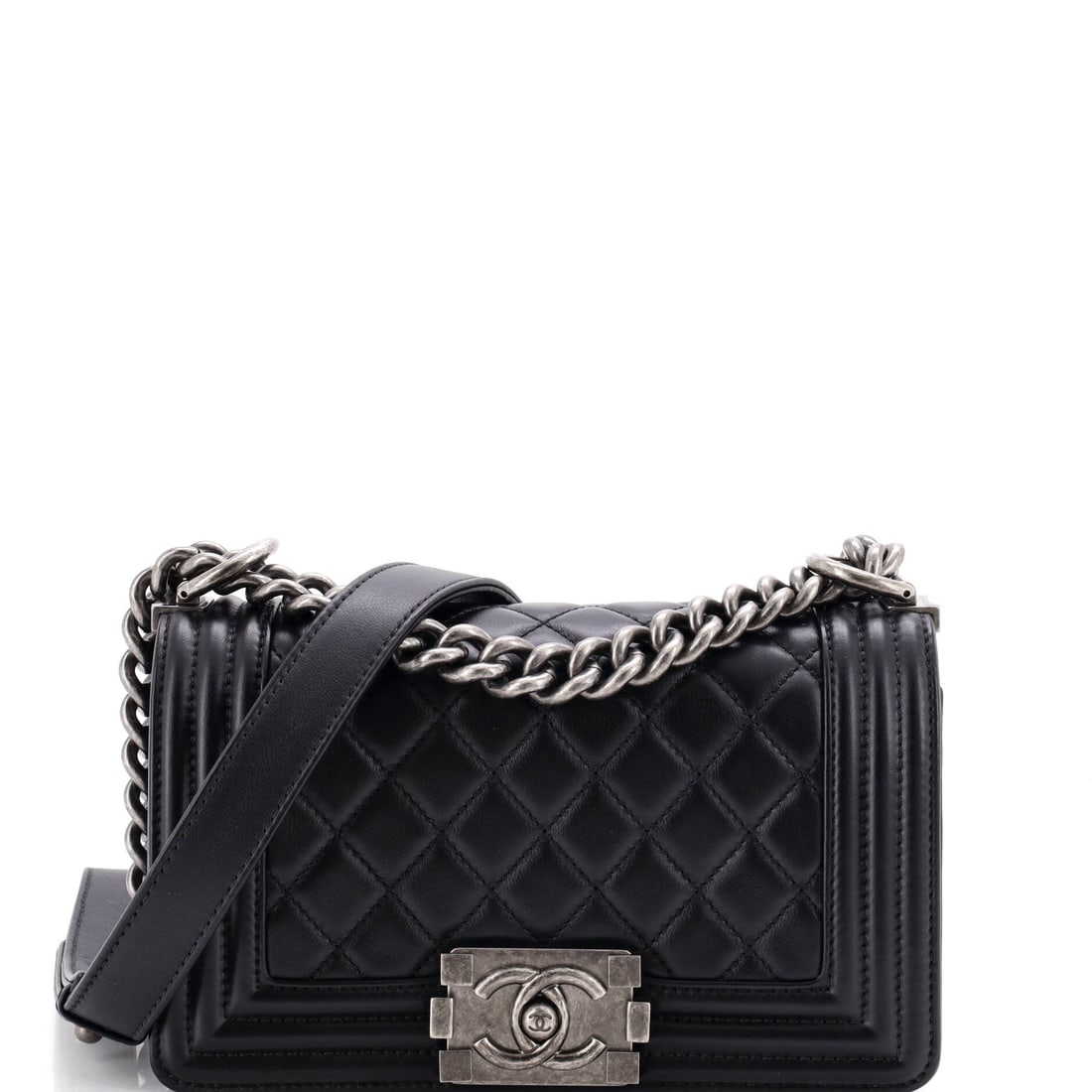 Chanel Boy Flap Bag Quilted Lambskin: At 7.5 by 5 by 3 inches this lambskin Boy sits just under the standard cut and reads more compact in hand while keeping the same 21-inch strap and 12-inch shoulder option. Soft leather takes the diamo