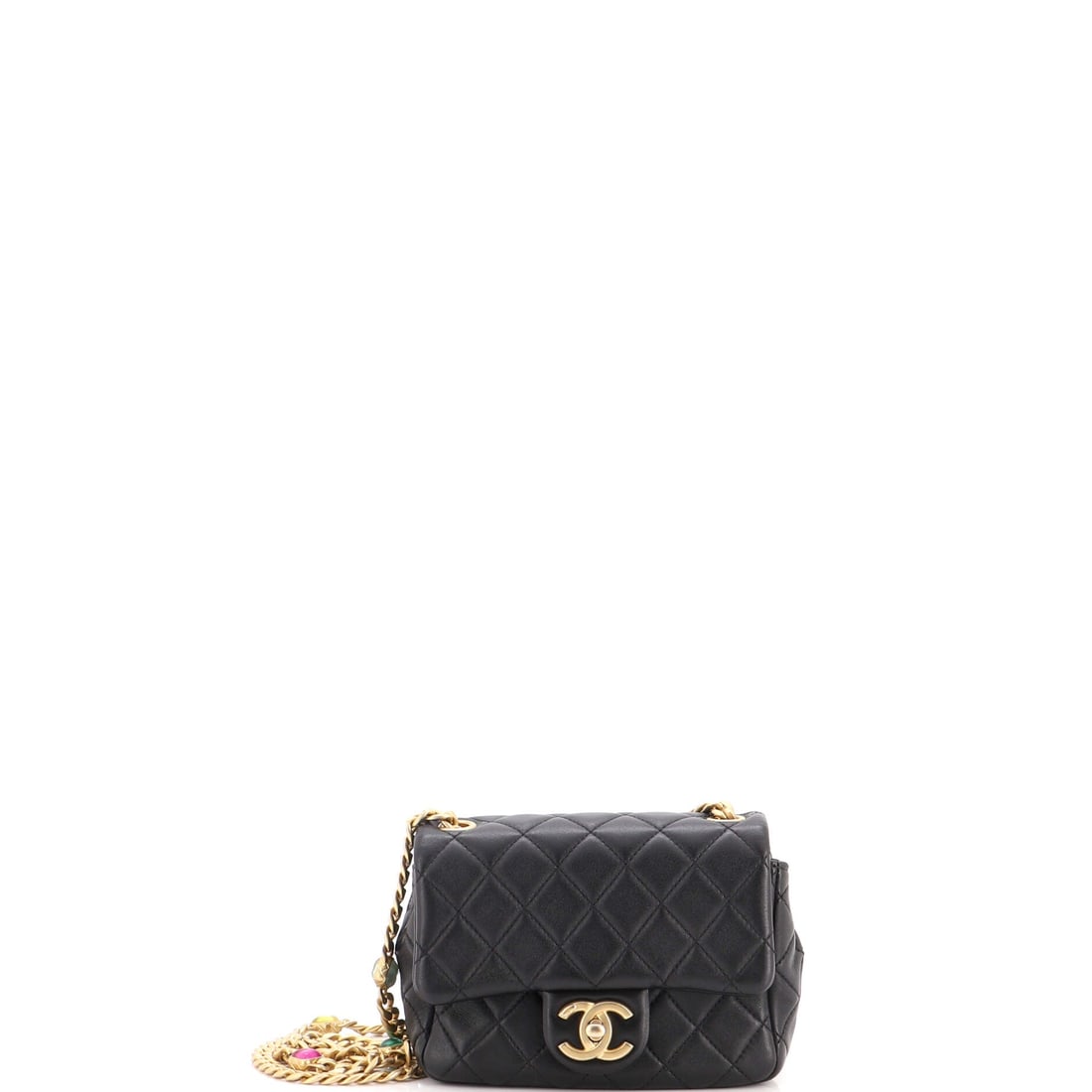 Chanel Pearl Samba Resin Chain Square Flap Bag Quilted Lambskin: Resin chain links change the weight and the sound of the bag, lighter and quieter than metal, with pearls set between them. The square body runs 6.5 by five by three inches, small in outline and deepe