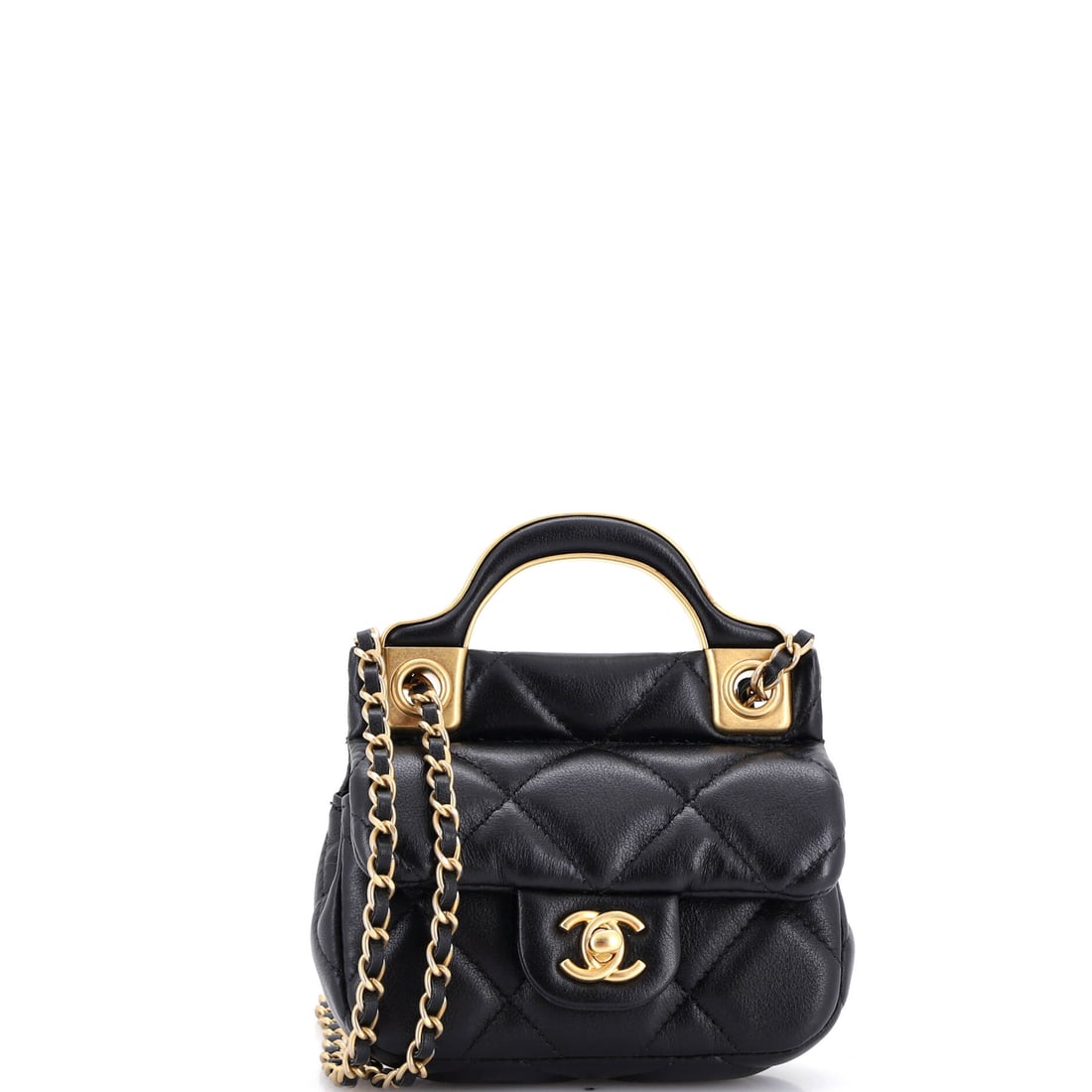 Chanel Lady Handle Flap Card Holder on Chain Quilted Calfskin: Chanel's Lady Handle card holder works because the handle is decorative and the chain is not: a 20 inch drop wears crossbody, while the 1 inch handle is really for lifting it off a table. Four inches 