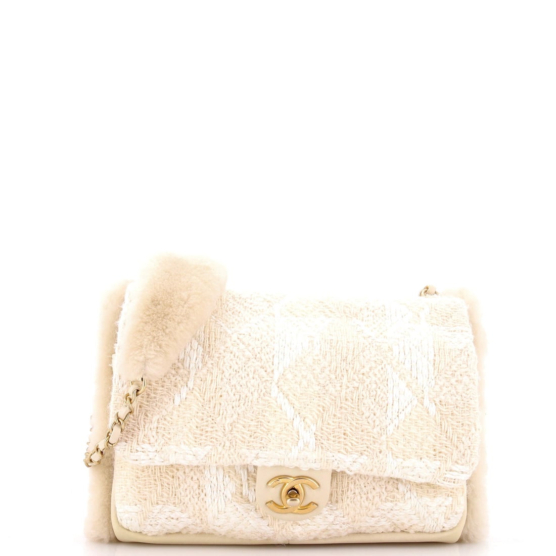 Chanel CC Muff Flap Bag Quilted Tweed and Lambskin with Shearling: Shearling turns the muff flap into a bag you put your hands into, with tweed and lambskin quilting holding the structure around it. At 11 inches wide and 8 high it is one of the larger flaps here, tho