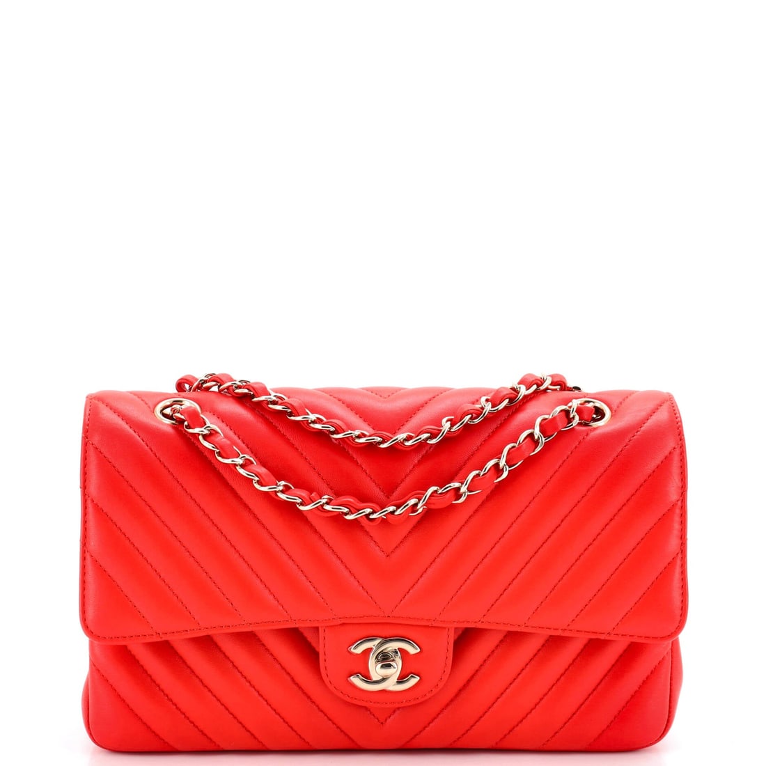 Chanel Classic Double Flap Bag Chevron Lambskin: The chevron cut runs across the flap in unbroken diagonals, which on lambskin gives a smoother, less pillowed surface than diamond quilting. Capacity is honest for the size, a 3 inch base under a 10 b