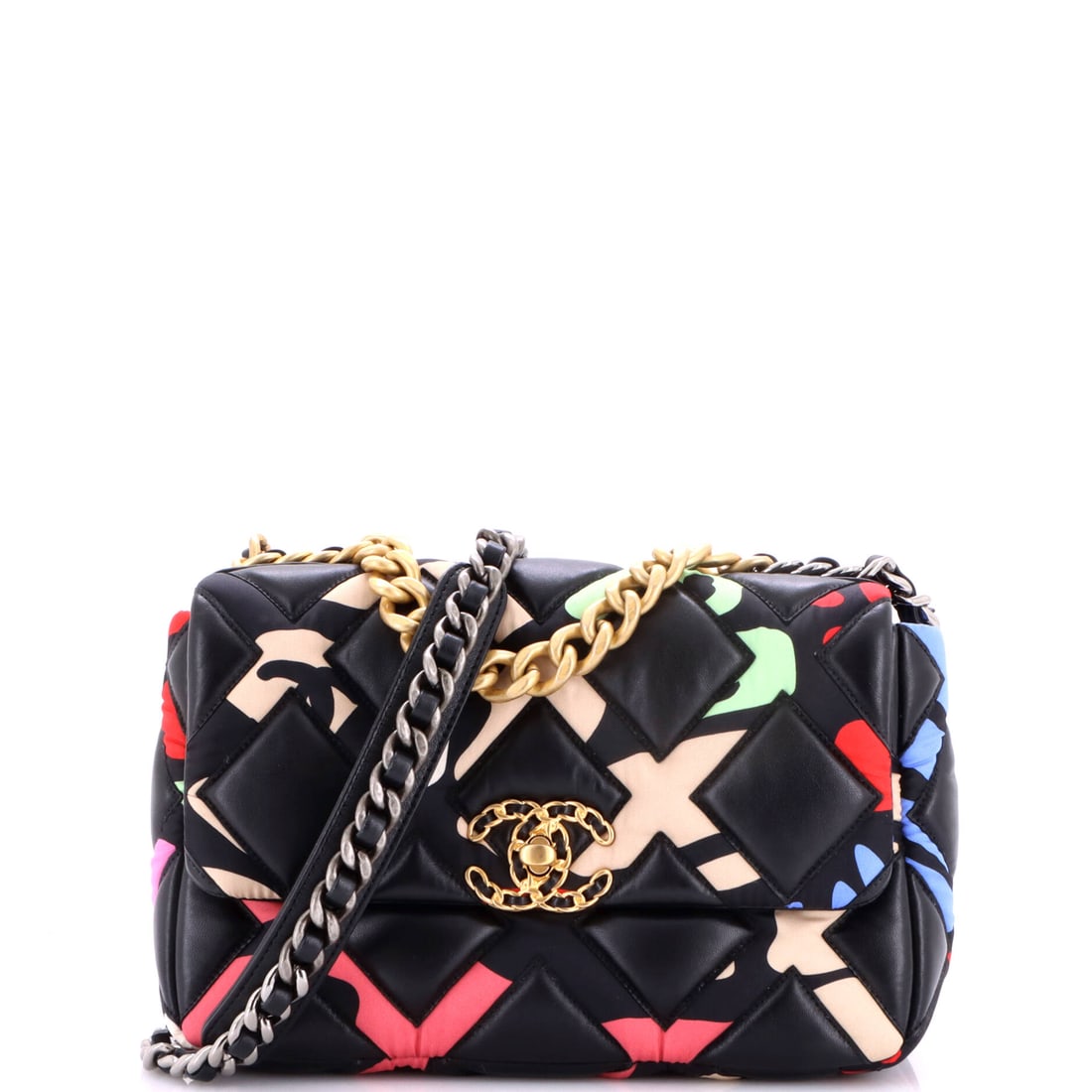 Chanel 19 Flap Bag Quilted Lambskin and Printed Silk: Pairing quilted lambskin with printed silk gives this 19 two textures across one diamond grid, matte leather against a sheen. Ten inches of width, 6.5 of height and 3.5 of depth put it at the size tha
