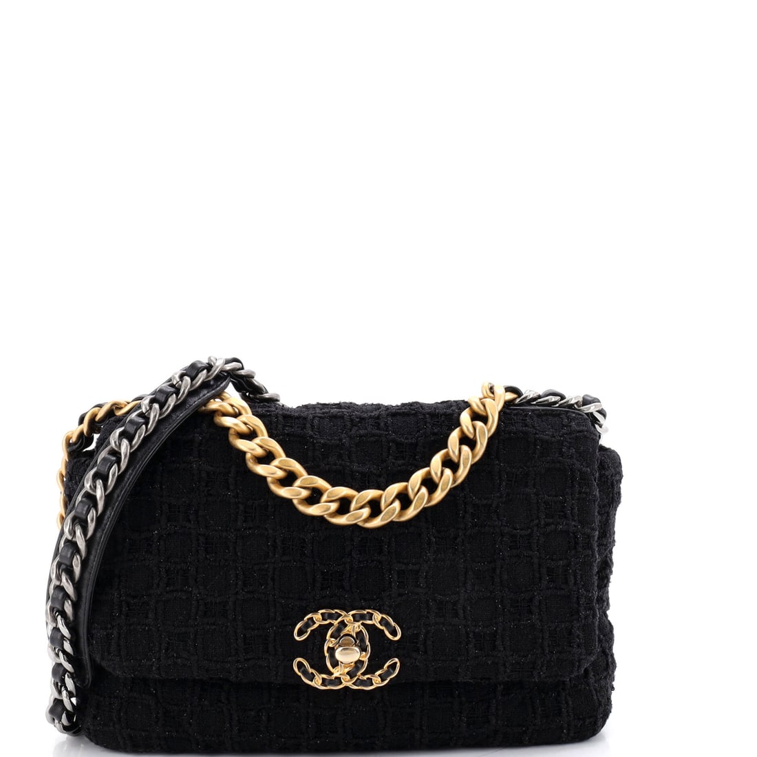 Chanel 19 Flap Bag Quilted Tweed: Ten by six by three inches is the everyday cut of this model, and in tweed it reads less formal than the lambskin versions without losing structure at the flap. That depth takes a phone, a cardholder 