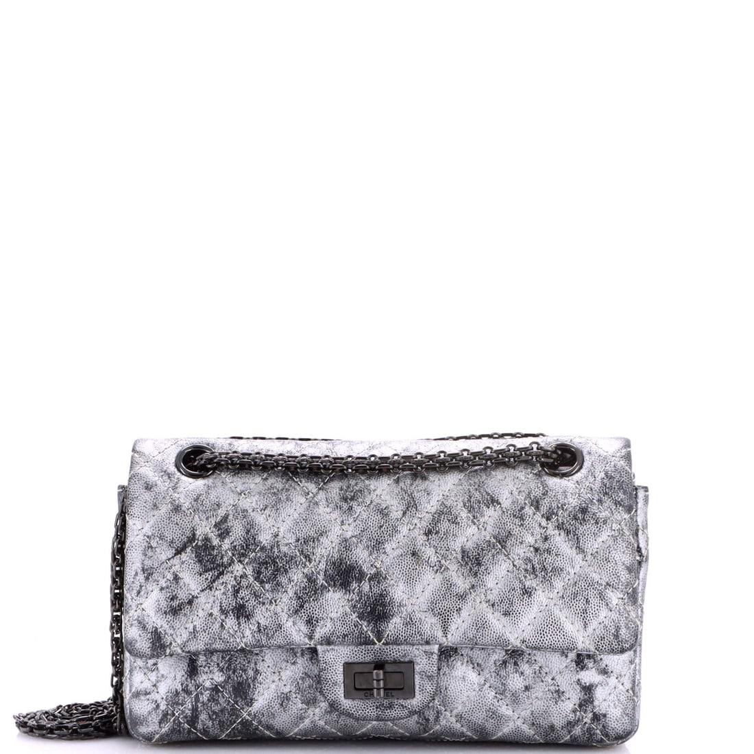 Chanel Reissue 2.55 Flap Bag Quilted Metallic Caviar: Caviar in a metallic finish is an unusual pairing for the Reissue, giving the pebbled grain a low shimmer that holds up better than smooth foiled leather. The 10 in width and 7 in height put it in the