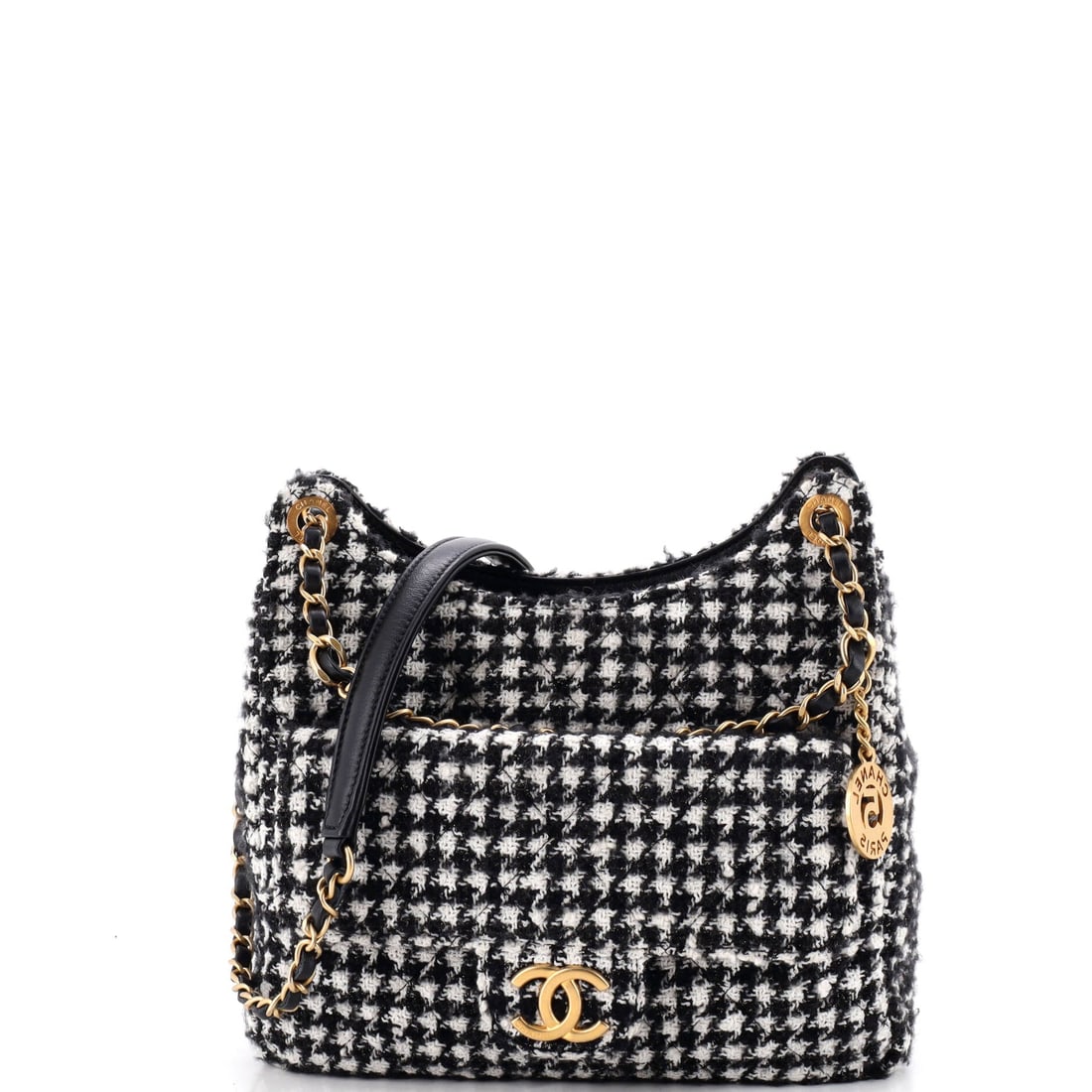 Chanel Wavy CC Hobo Quilted Tweed: Tweed on a hobo shape is a textural argument, and at 10 x 8.5 x 2.5 in there is plenty of surface to make it. The wavy CC sits against quilting that reads softer in cloth than in calf. Condition reads
