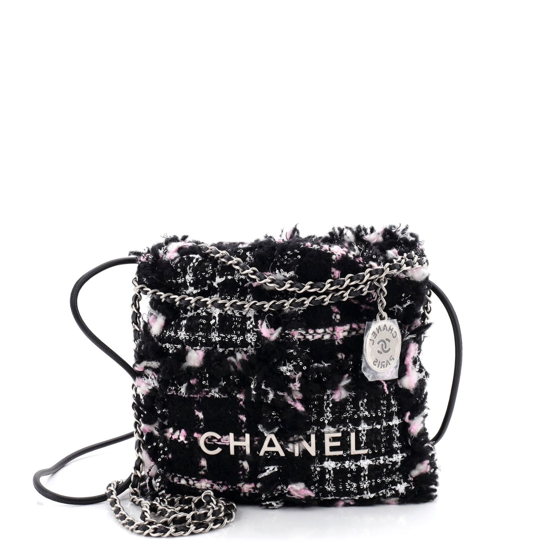 Chanel 22 Chain Hobo Quilted Tweed: Tweed changes the weight of the 22 entirely, softening the quilting into something closer to a woven texture than a stitched grid. Seven inches wide by 7.5 high with 2.5 inches of depth, it stays a mo