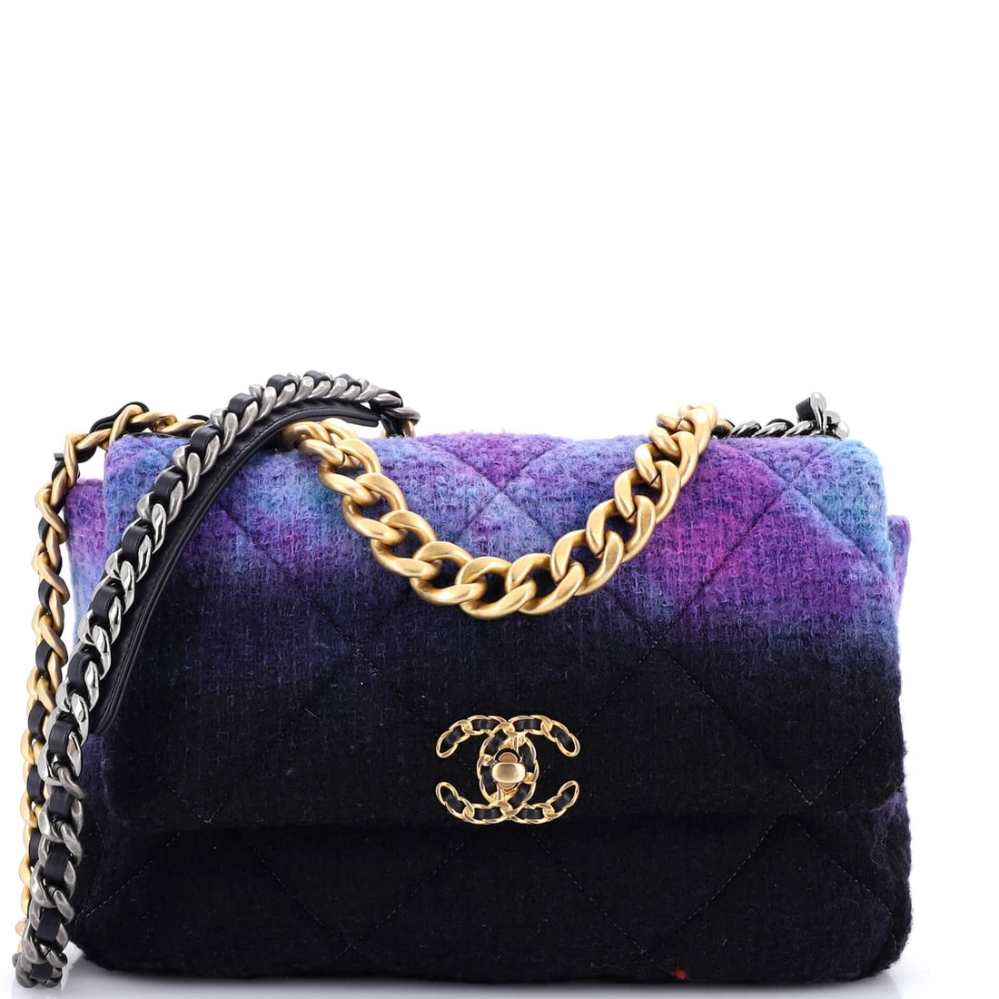 Chanel 19 Flap Bag Quilted Degrade Wool: Degrade wool shifts tone across the panel, so the quilting reads as gradient rather than flat repetition. Grade B - Excellent, with wear that stays in the fabric's favor. Twelve inches wide against a 