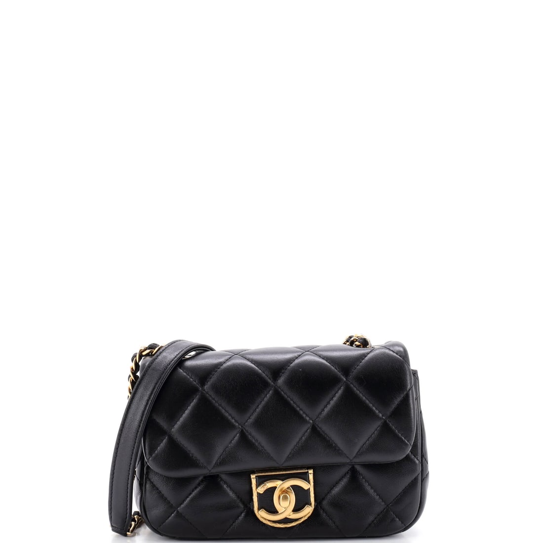 Chanel Quilt Metal Edge CC Flap Bag Quilted Lambskin: Metal edging traces the flap and gives the quilting a hard border, which is the whole argument for this version. Seven inches wide by 5.5 high with two inches of depth, it is a flat, dressy propositio