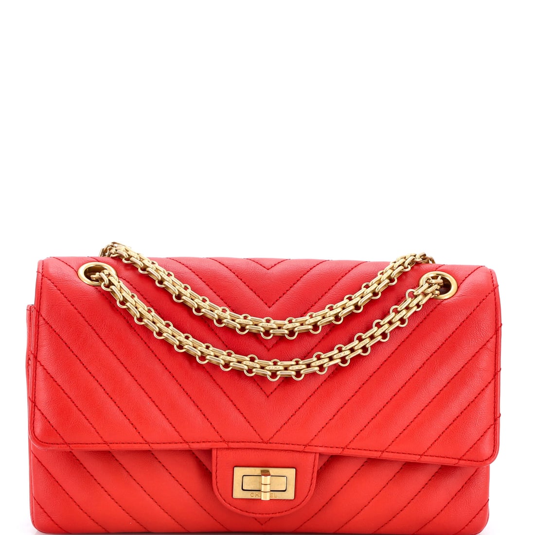 Chanel Reissue 2.55 Flap Bag Chevron Sheepskin: Chevron instead of diamond quilting gives this Reissue a directional surface, and sheepskin keeps it soft to the hand. The Mademoiselle lock and all-metal chain are what separate the 2.55 from the Cla