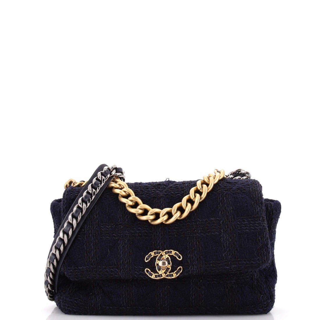 Chanel 19 Flap Bag Quilted Tweed: At 12 inches wide and 8 high, this is the tweed 19 at its largest, and 4 inches of depth turn it into a genuine carryall rather than a dinner bag. The weave spreads over broad panels, so the quilt sca