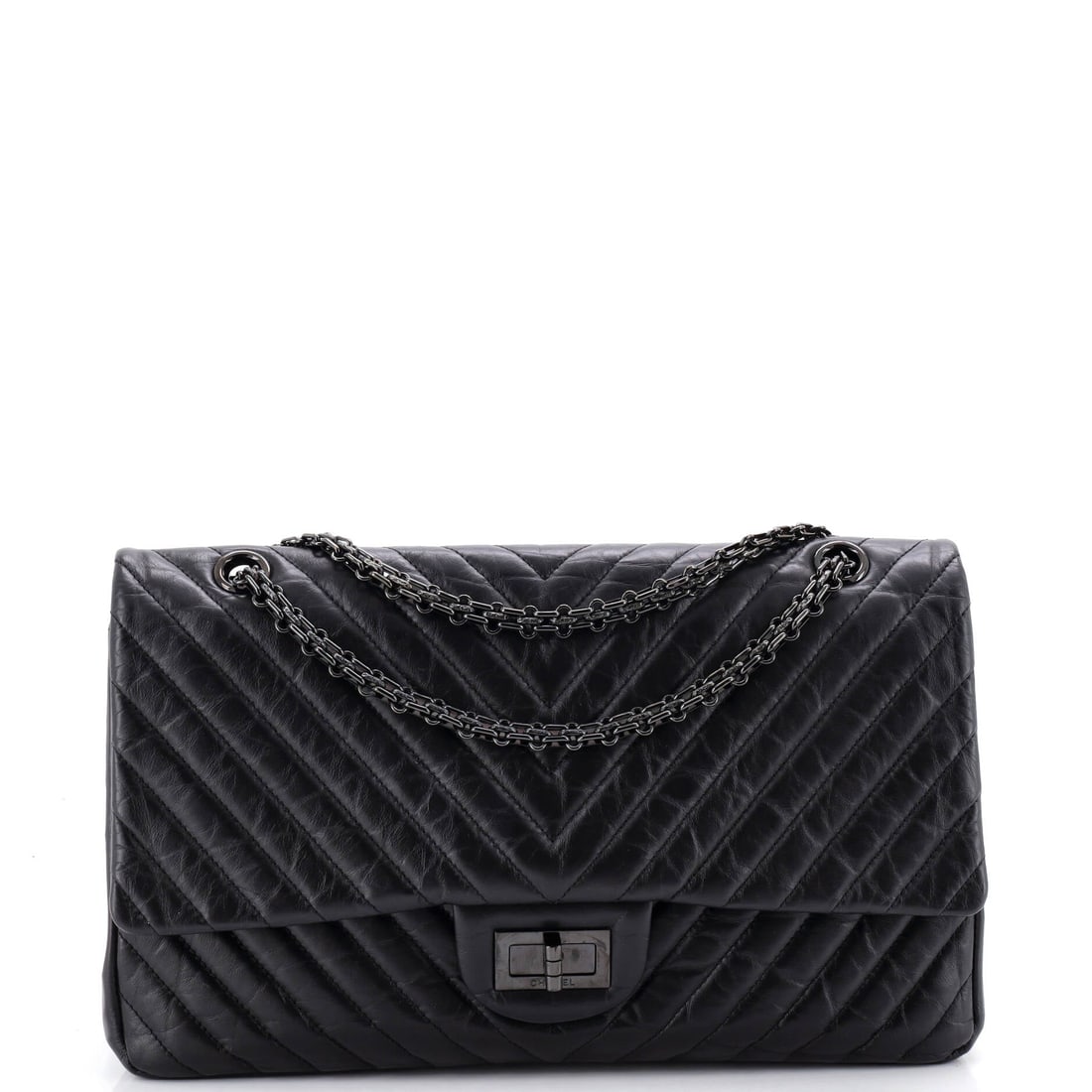 Chanel So Black Reissue 2.55 Flap Bag Chevron Aged Calfskin: A 3 in handle drop tells you this Reissue is meant to be carried on its chain, which runs 19 in over the shoulder. The 12 x 7.5 in body sits at the larger end of the 2.55 range, with 3.5 in of depth t
