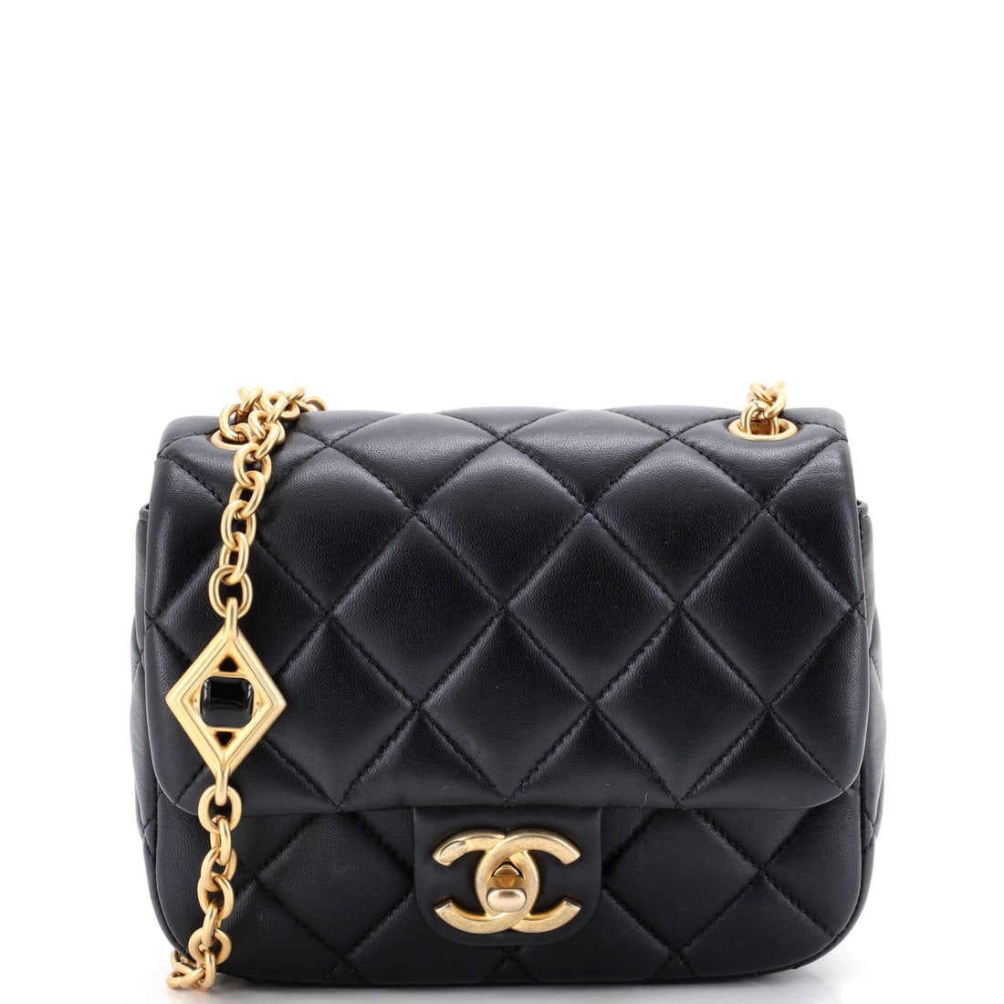 Chanel CC Enamel Pearl Charm Me Square Flap Bag Quilted Lambskin: Enamel and pearl charms hang off the Charm Me square flap, doing the decorative work while the quilted lambskin body stays quiet behind them. The near-square 7 by 6.5 inch proportion is the whole idea