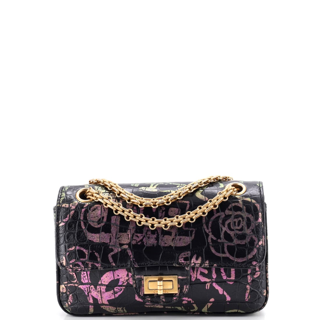 Chanel Reissue 2.55 Flap Bag Graffiti Crocodile Embossed Calfskin: Crocodile embossing under a graffiti treatment makes this Reissue a loud object by 2.55 standards, the print running straight across the quilt lines. Eight inches wide by five high with three inches o