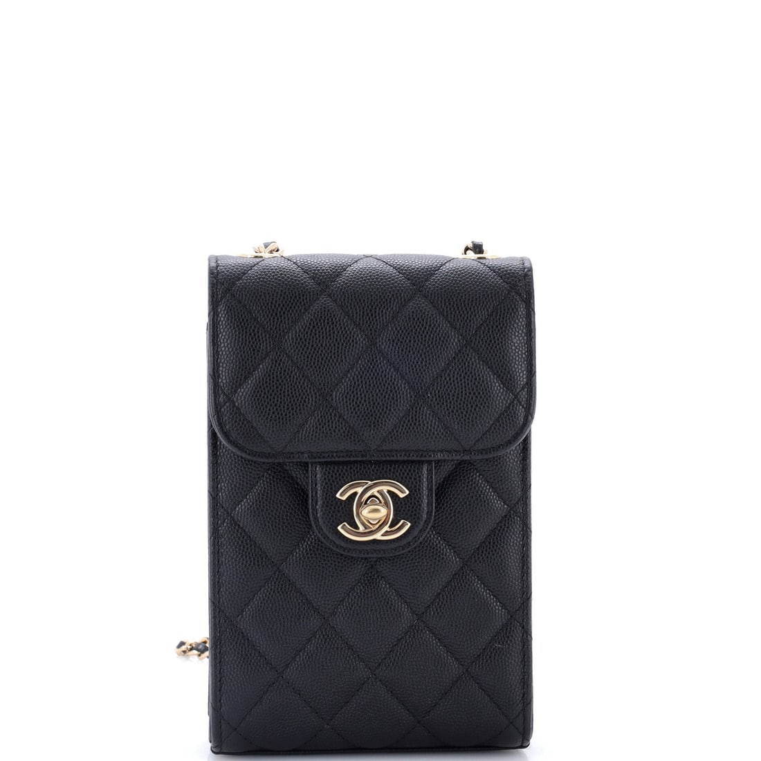 Chanel CC Flap Phone Holder Crossbody Bag Quilted Caviar: Upright and narrow, this quilted caviar phone holder measures 7.5 inches tall against 4.5 across, a ratio that reads more pendant than purse on the body. Two inches of depth is enough for a slim card 
