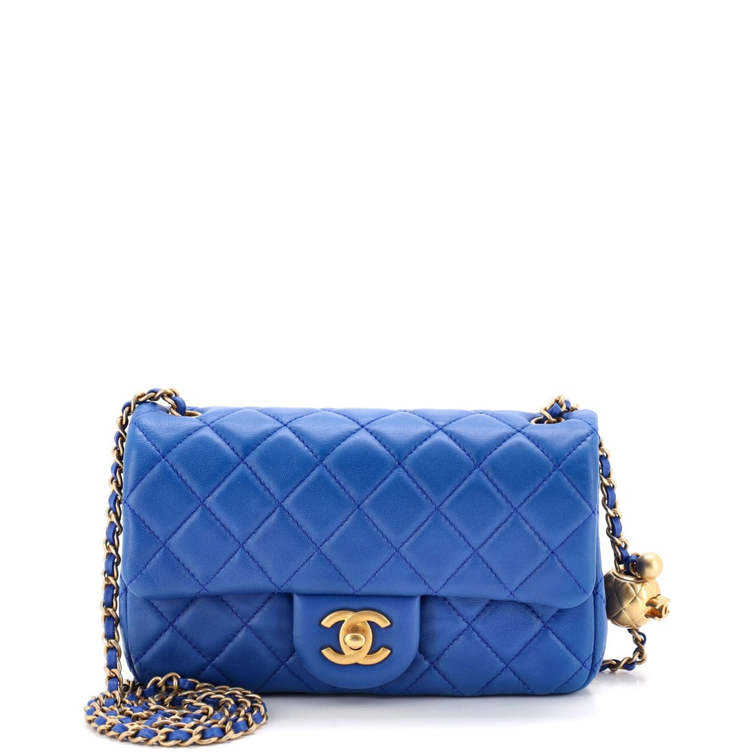 Chanel Pearl Crush Flap Bag Quilted Lambskin: Diamond quilting runs edge to edge on the lambskin, uninterrupted except where the pearl-set chain meets the body. Grade B - Excellent, so the leather still has its structure. At 7.5 by five by 2.5 in