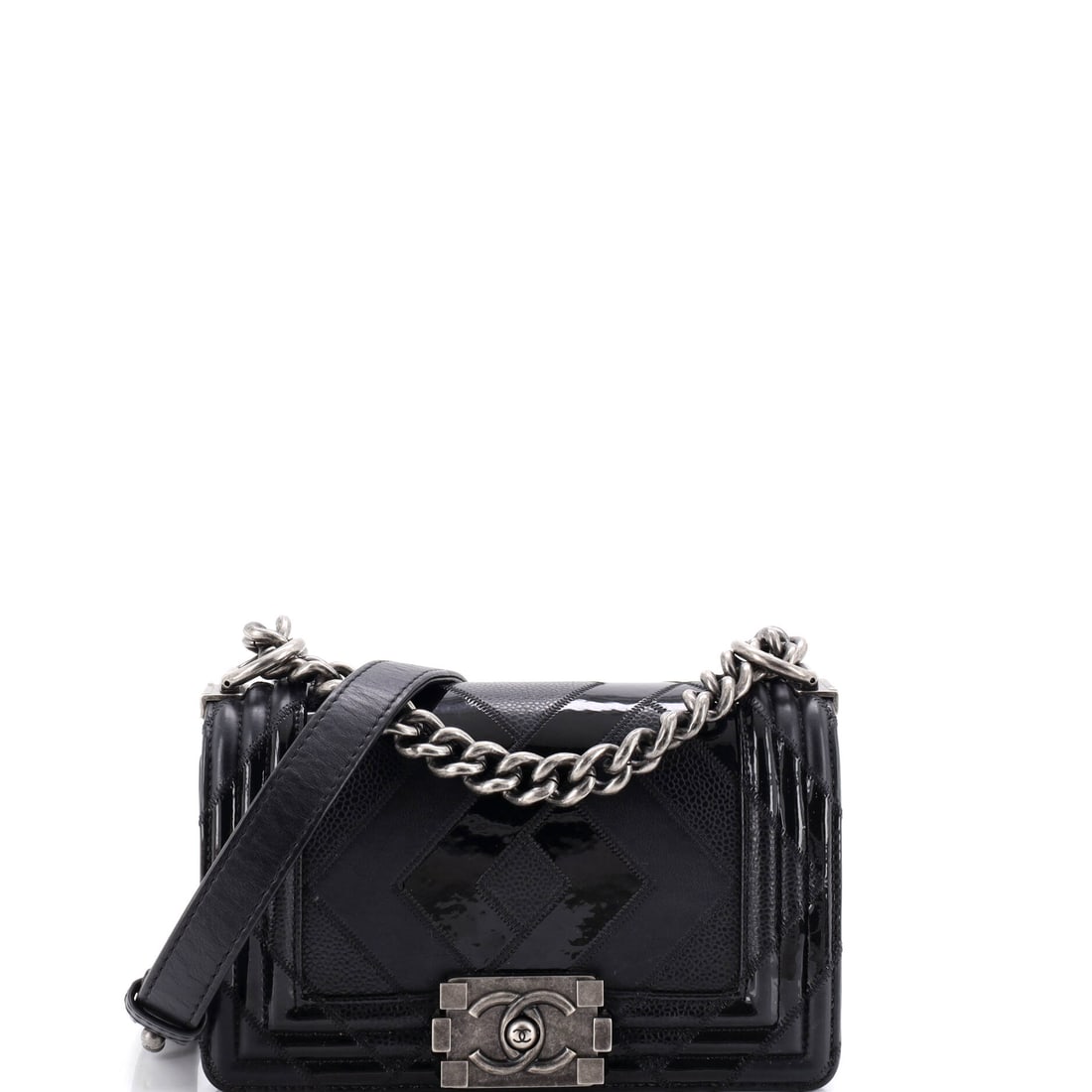 Chanel Boy Flap Bag Patchwork Caviar, Patent and Calfskin: Patchwork across caviar, patent and smooth calfskin gives the flap three surfaces catching light at once, and the patent squares do most of the shining. The 8 by 5 by 3 inch body is the sensible every
