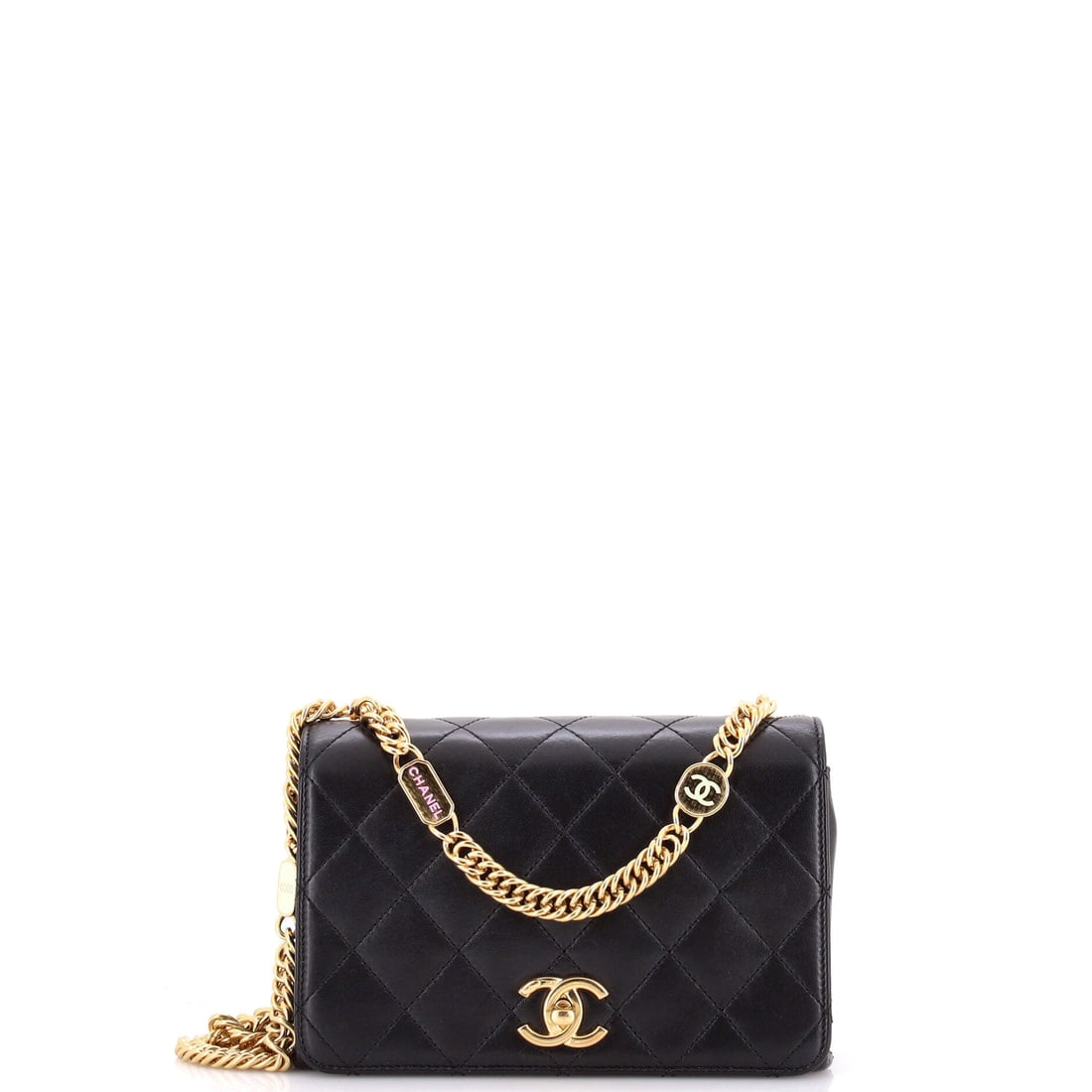 Chanel Logo Enamel Full Flap Bag Quilted Lambskin: Enamel logo hardware sits against quilted lambskin on this full flap, a glossier read than plain metal on the same panel. Eight inches wide by 5 high with a 3 inch base makes it a proper small bag rat