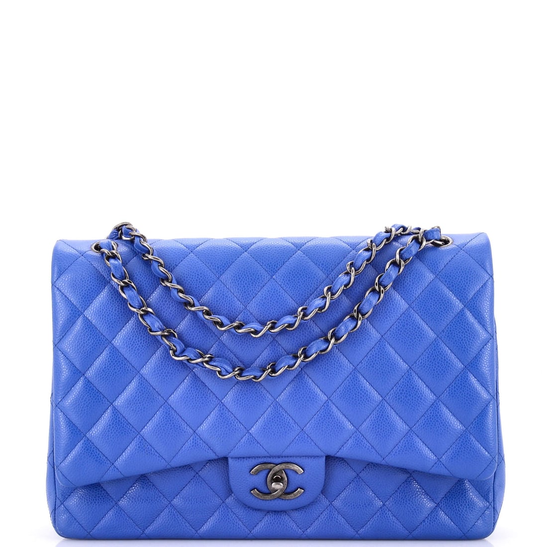 Chanel Classic Double Flap Bag Quilted Caviar: At 12.5 by 9 by 3.5 inches this is the Classic at its most useful, with room for a slim laptop alongside the usual contents. Caviar carries that weight better than lambskin, resisting the sag a loaded